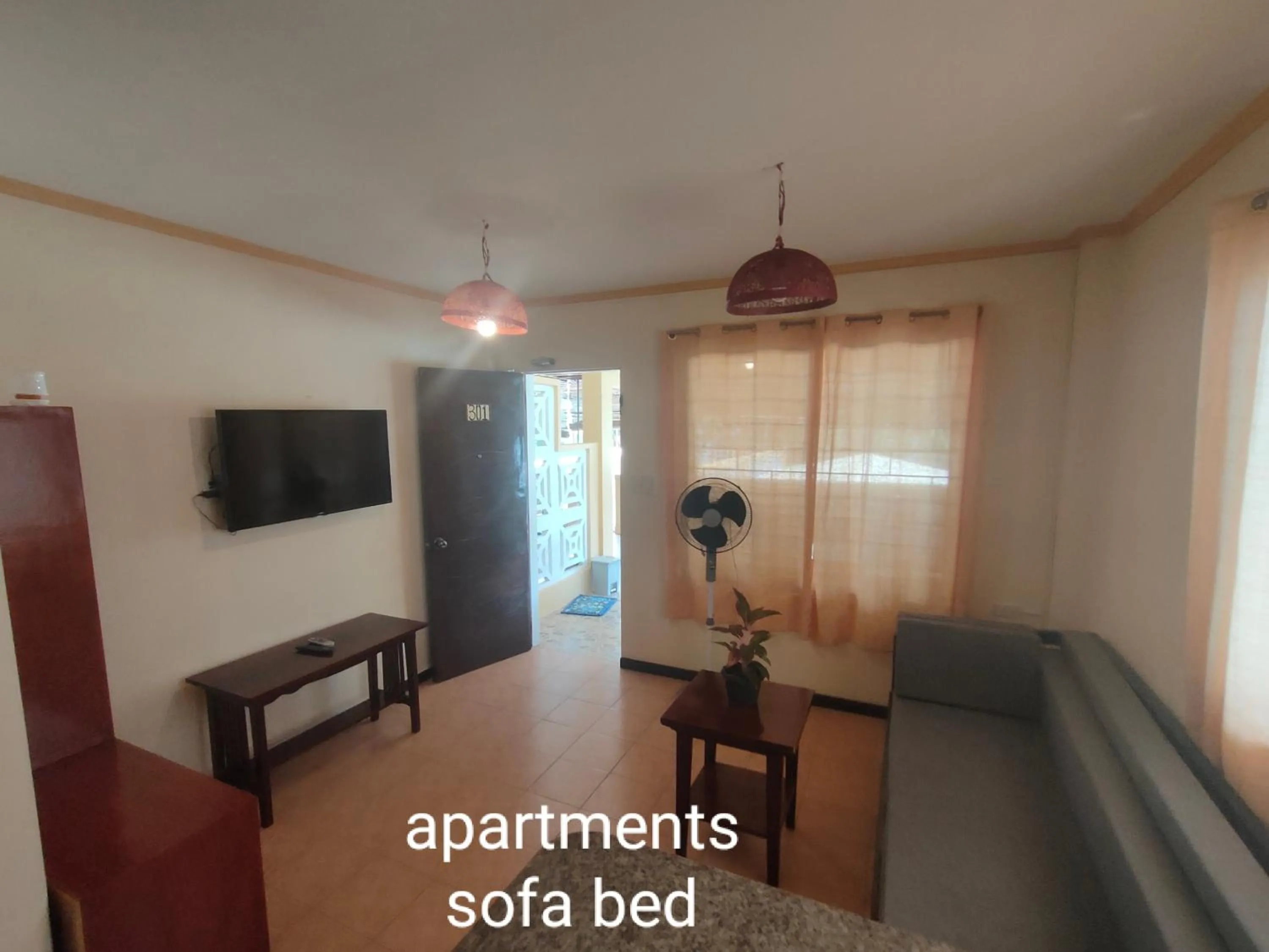 Living room, Bed in Sulu Plaza