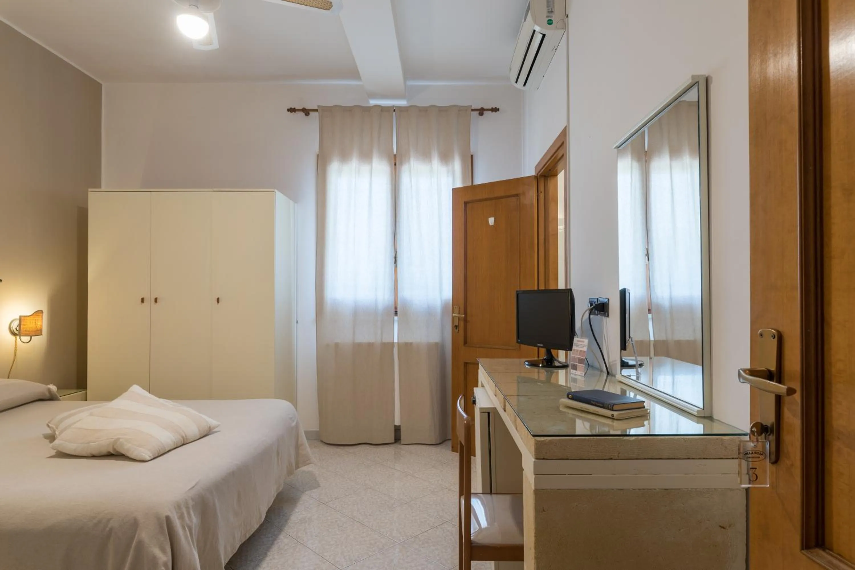 Bed in Piccolo Hotel Villa Rosa