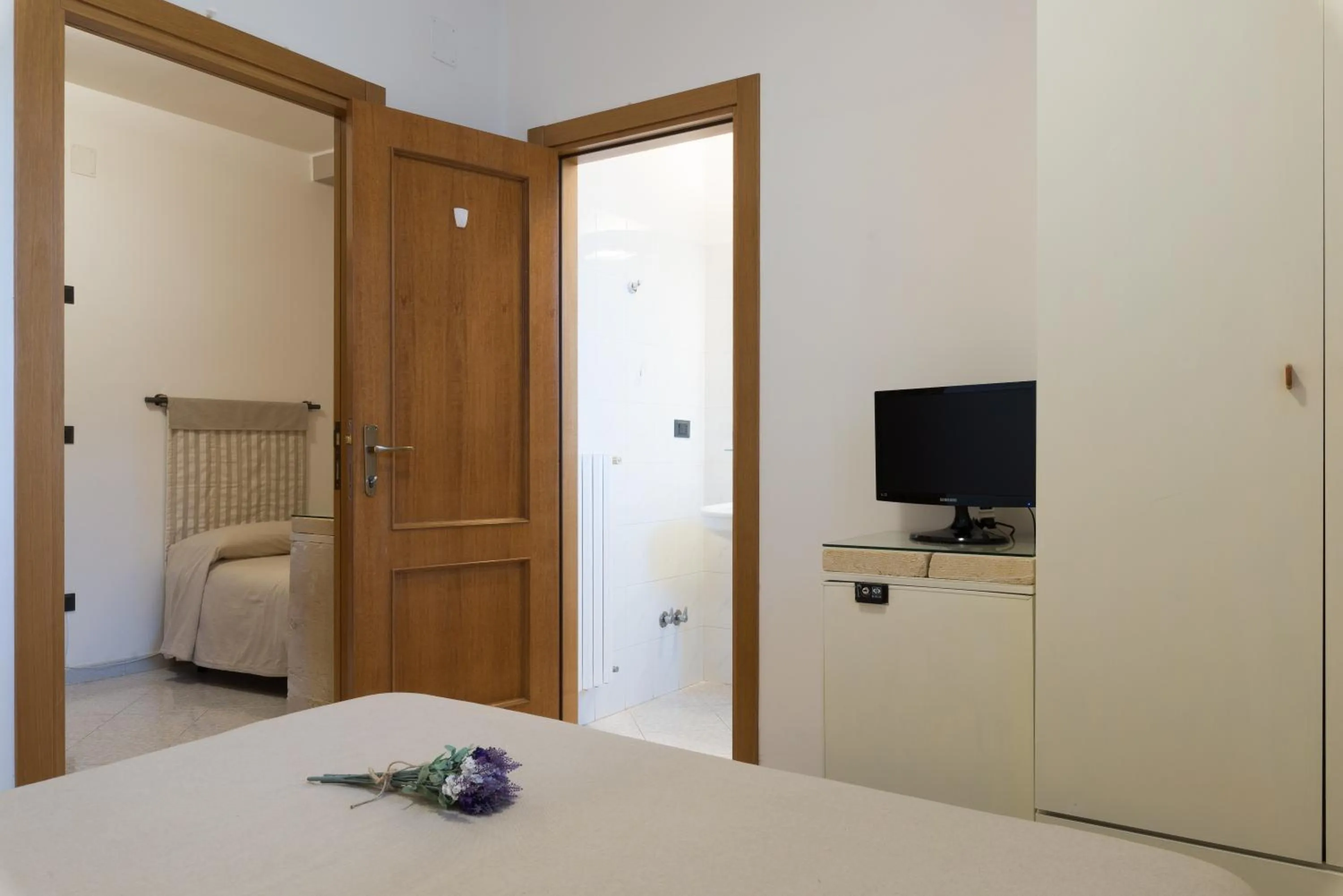 Bed in Piccolo Hotel Villa Rosa