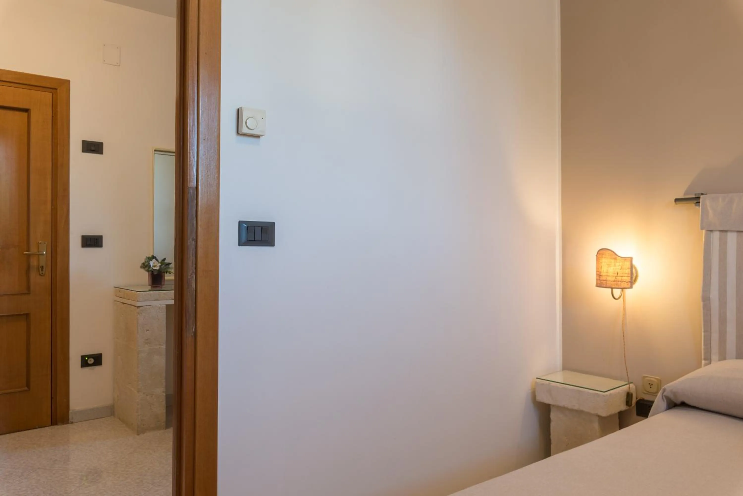 Bed in Piccolo Hotel Villa Rosa