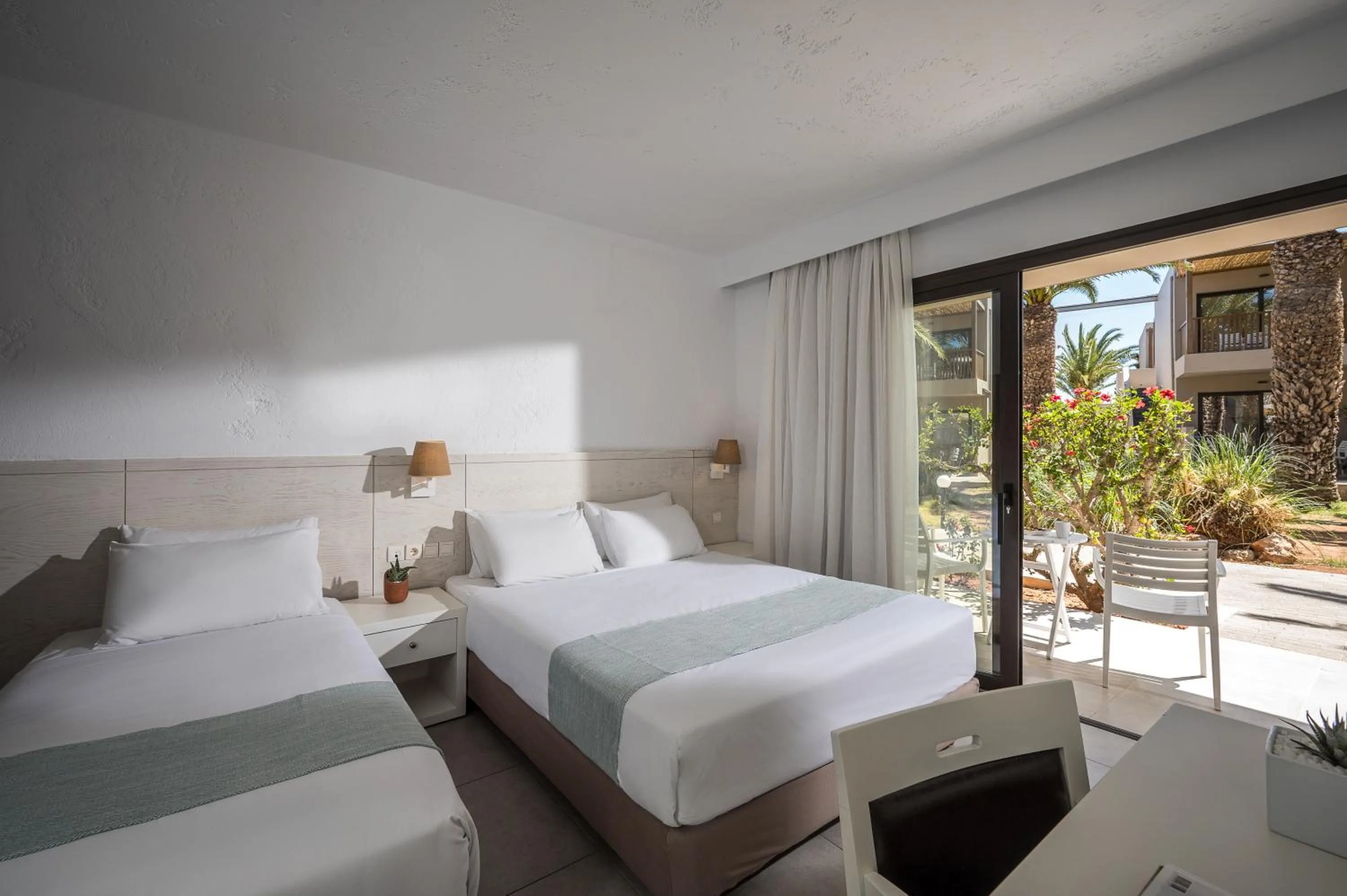 Bed in Stella Village Seaside Hotel