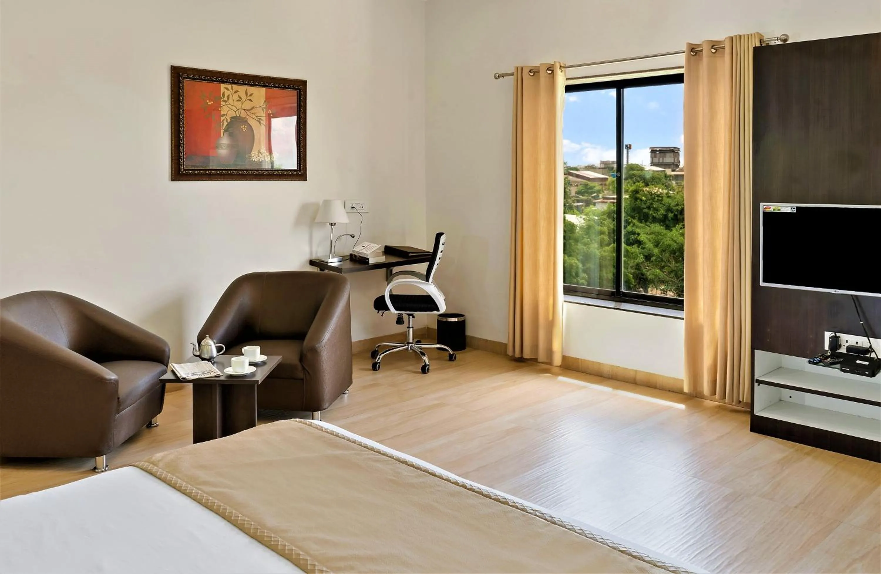 Photo of the whole room, Bed in The Fern Residency Parbhani