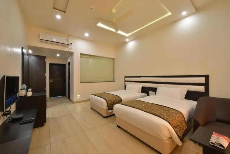 Bedroom, Bed in The Fern Residency Parbhani