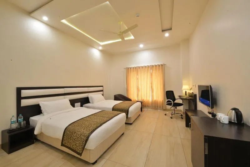 Bedroom, Bed in The Fern Residency Parbhani