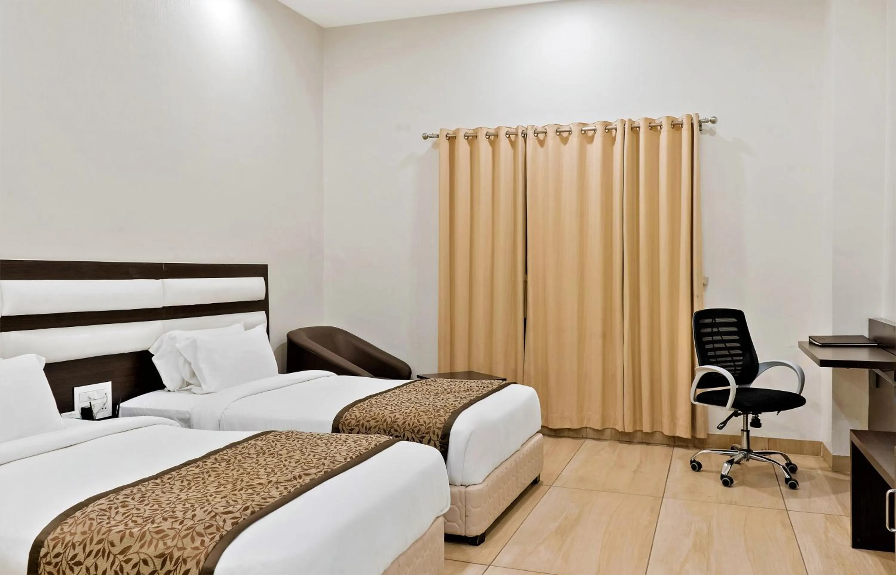 Bedroom, Bed in The Fern Residency Parbhani