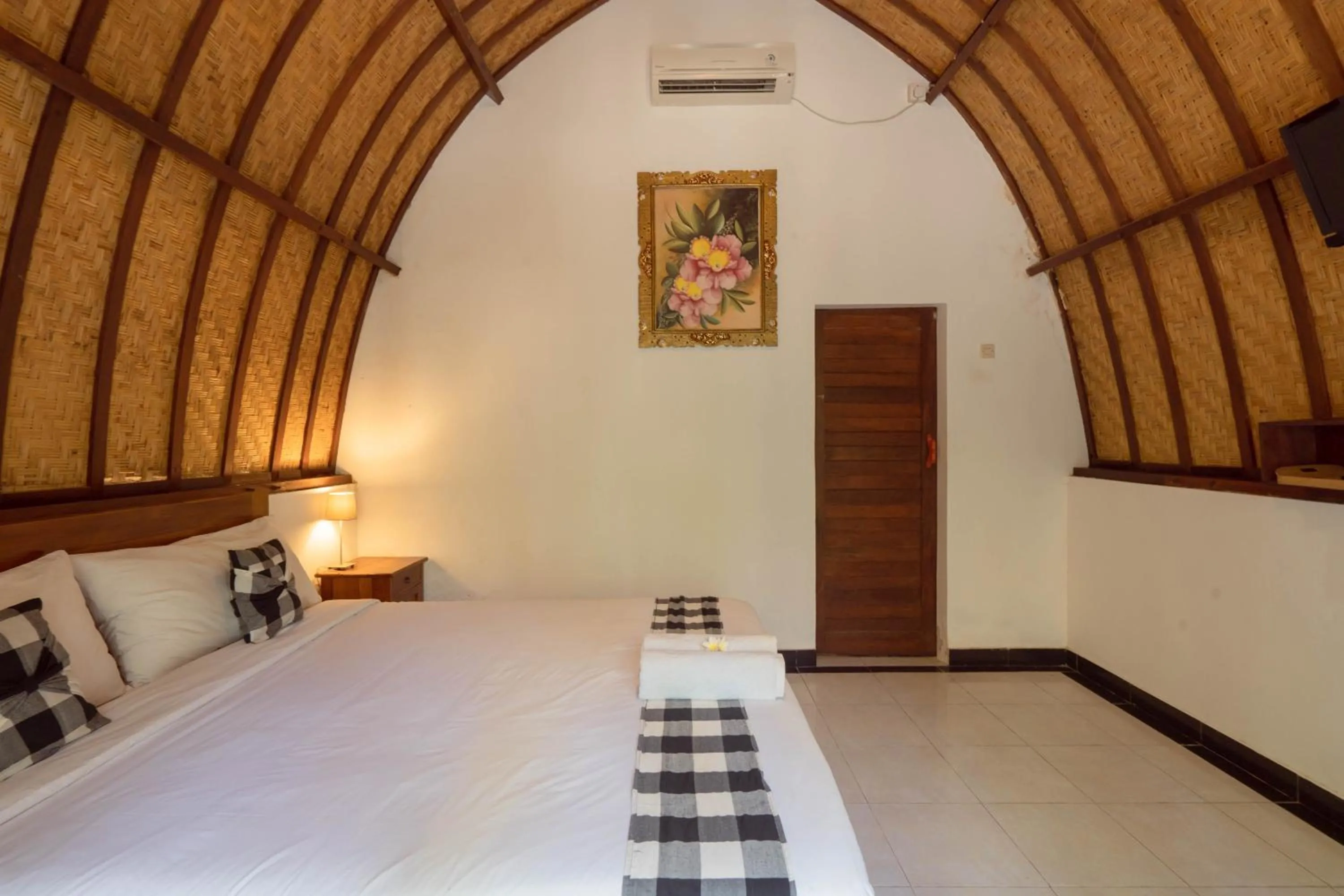 Bedroom, Bed in Ratu Cottage by OurStory Travels