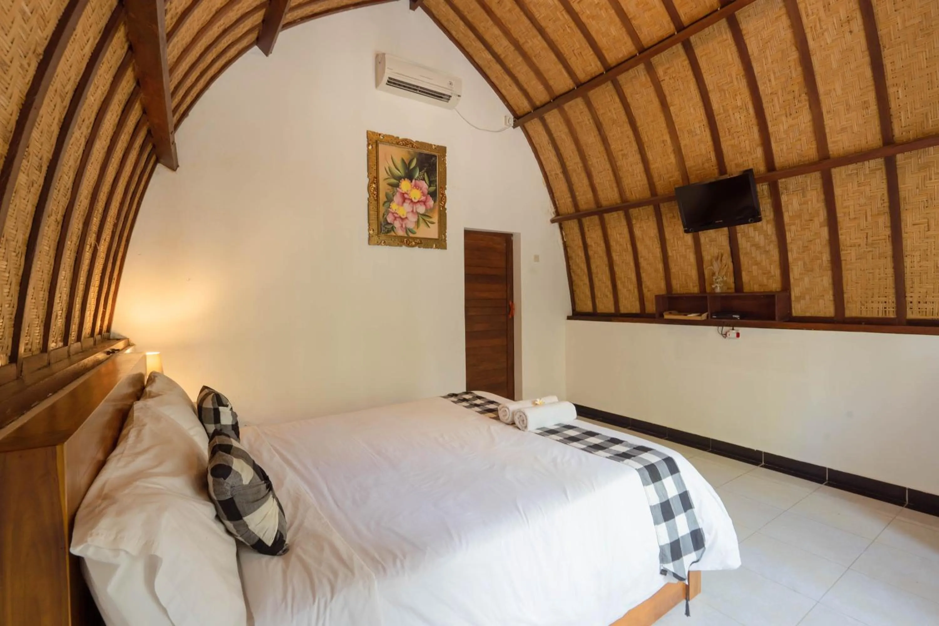 Bedroom, Bed in Ratu Cottage by OurStory Travels