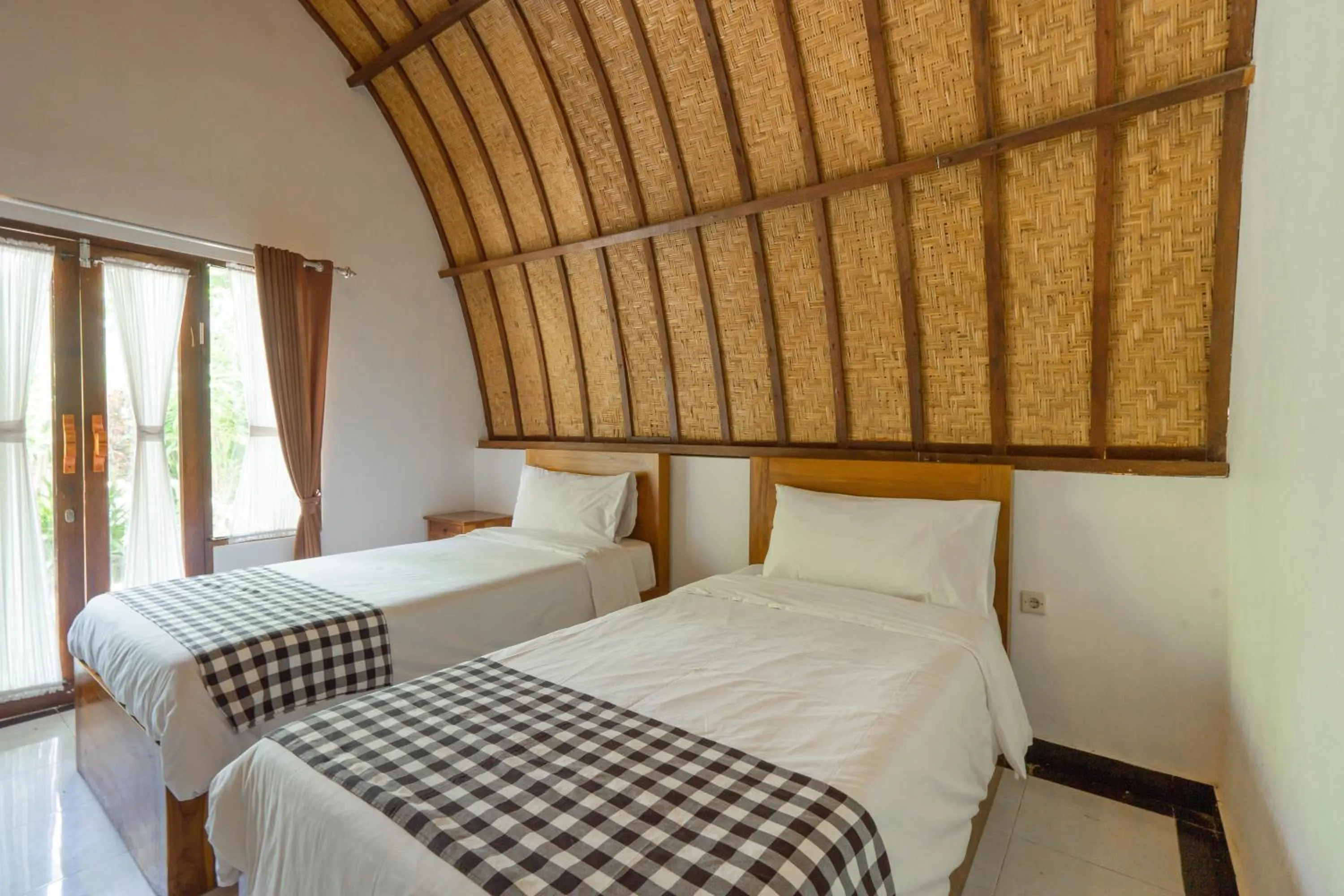 Bedroom, Bed in Ratu Cottage by OurStory Travels