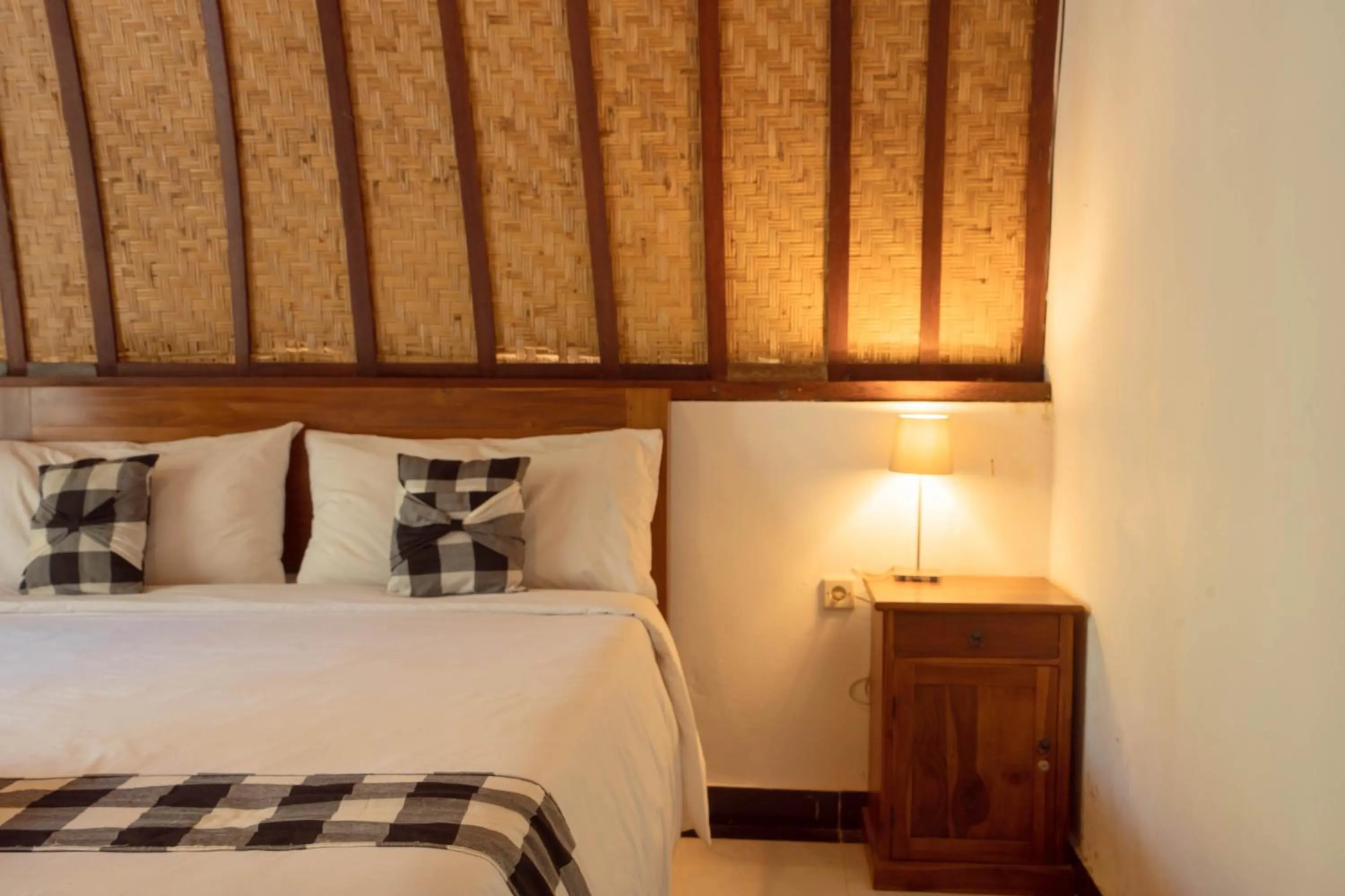 Bedroom, Bed in Ratu Cottage by OurStory Travels