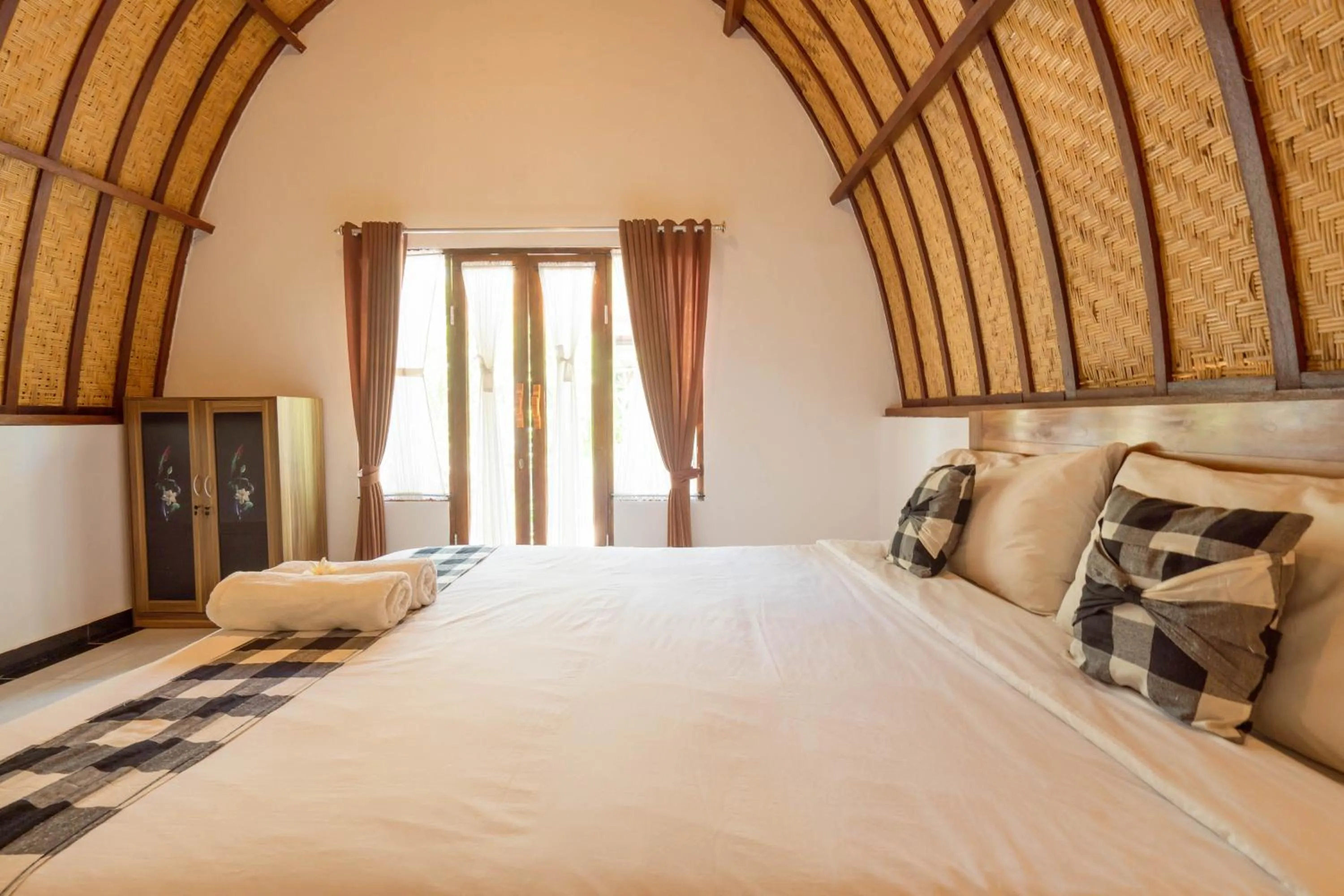 Bedroom, Bed in Ratu Cottage by OurStory Travels