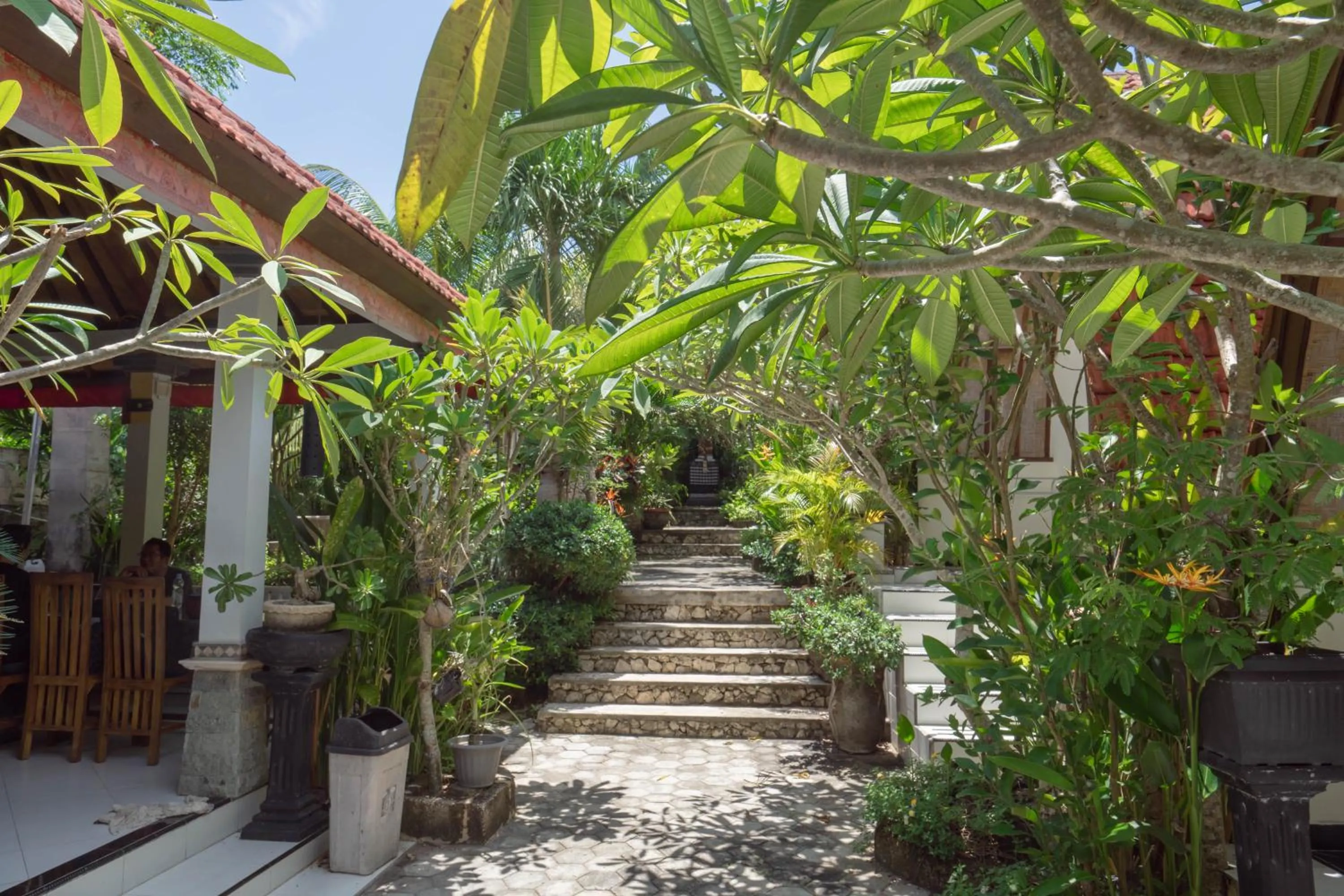 Garden in Ratu Cottage by OurStory Travels