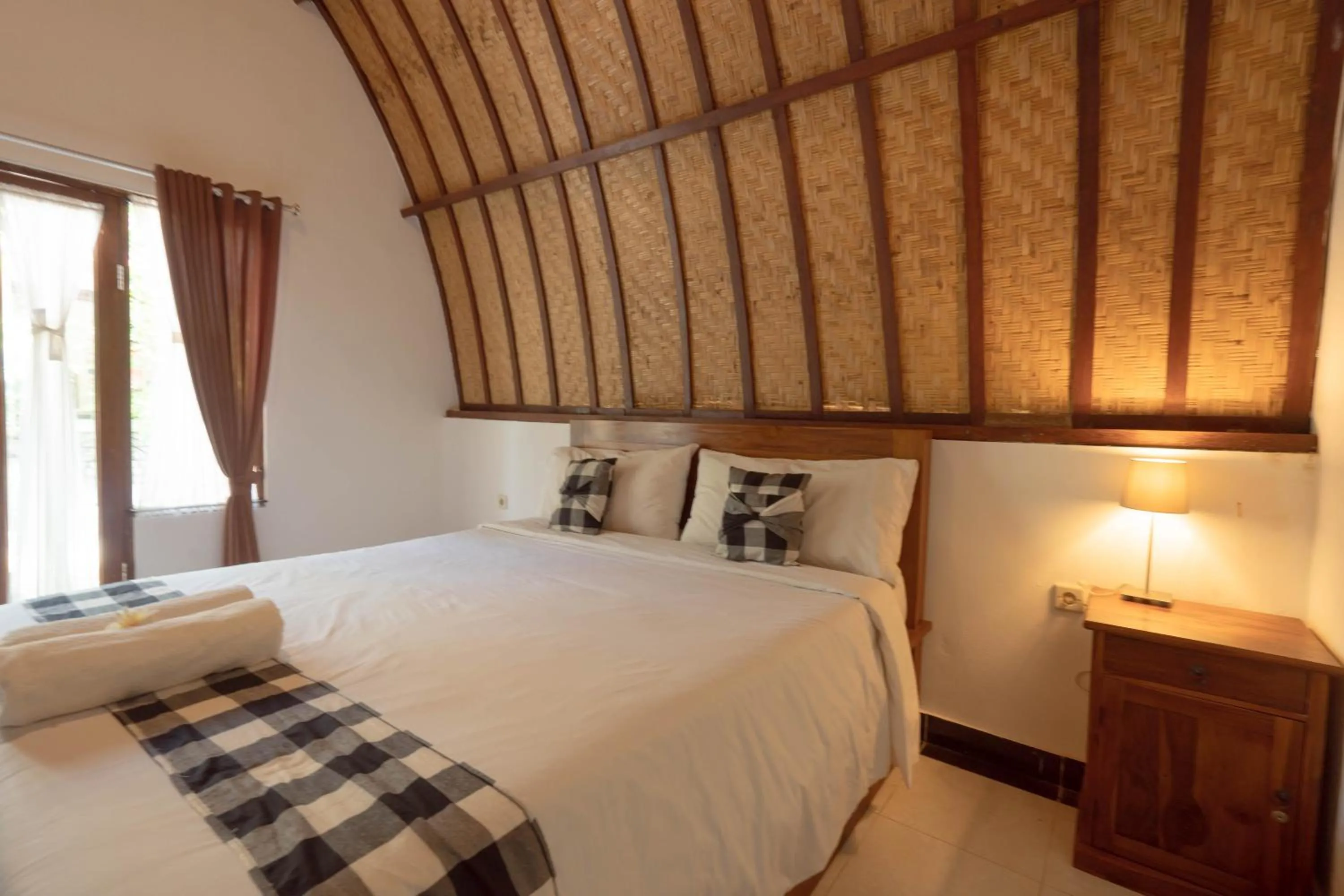 Bedroom, Bed in Ratu Cottage by OurStory Travels