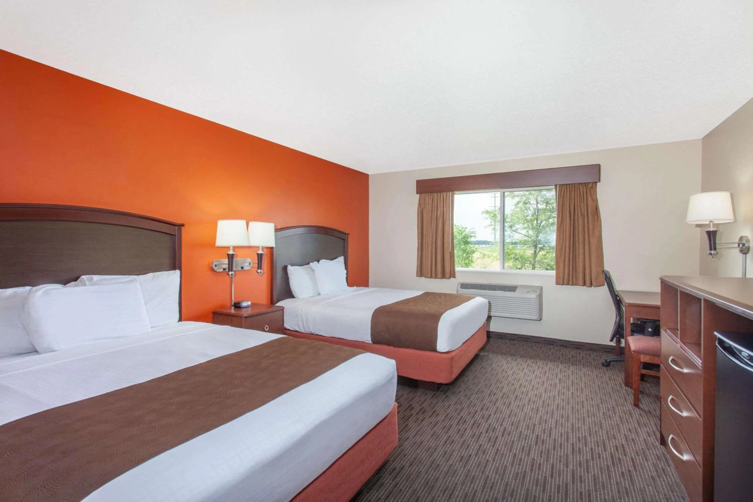 Photo of the whole room, Bed in AmericInn by Wyndham St Cloud MN I-94