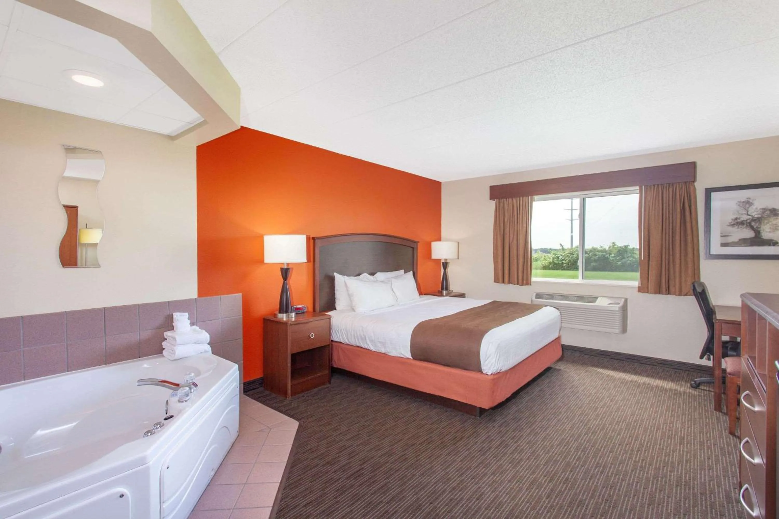 Photo of the whole room, Bed in AmericInn by Wyndham St Cloud MN I-94