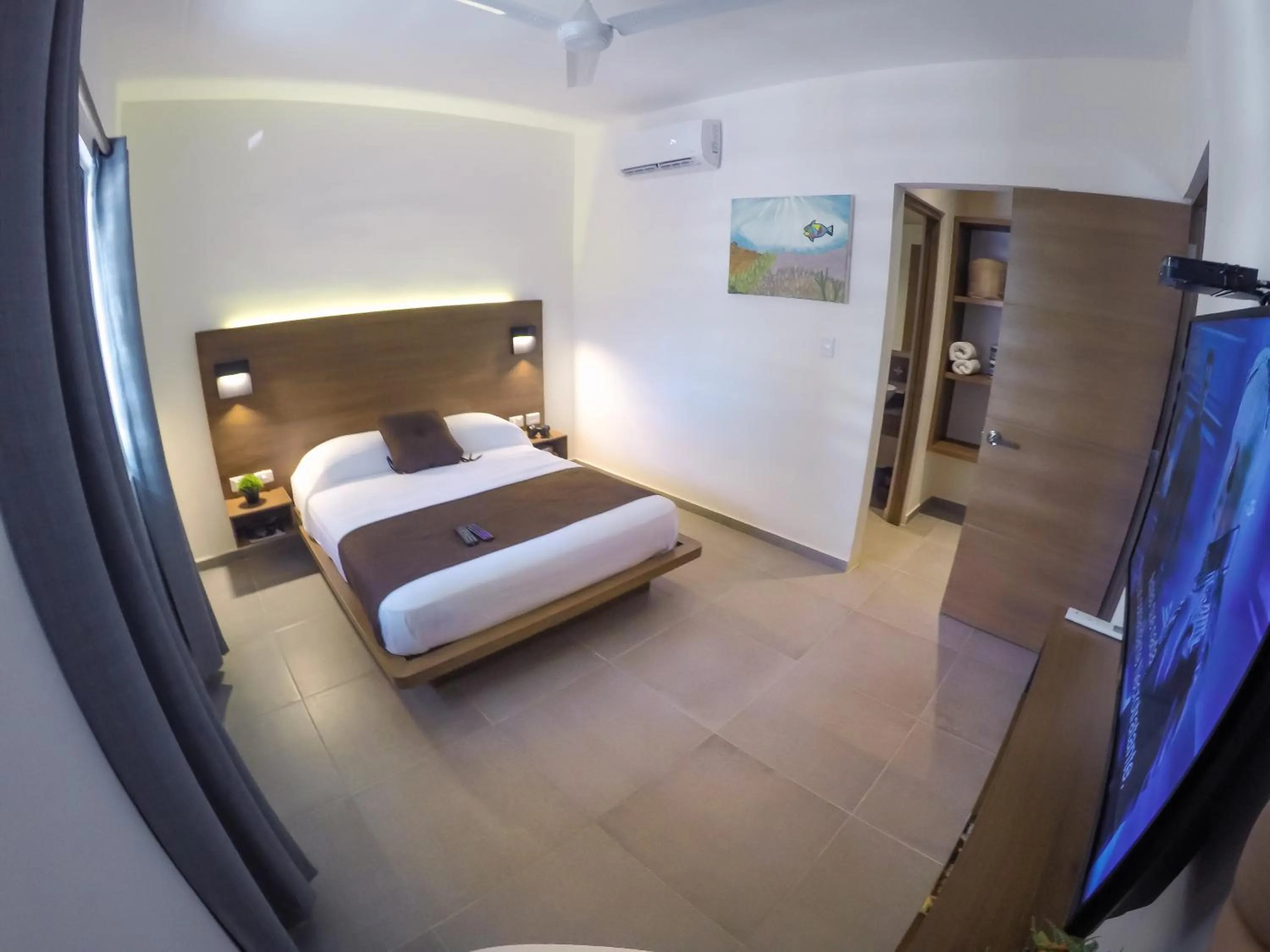 Bed in Viento Suites Cancún