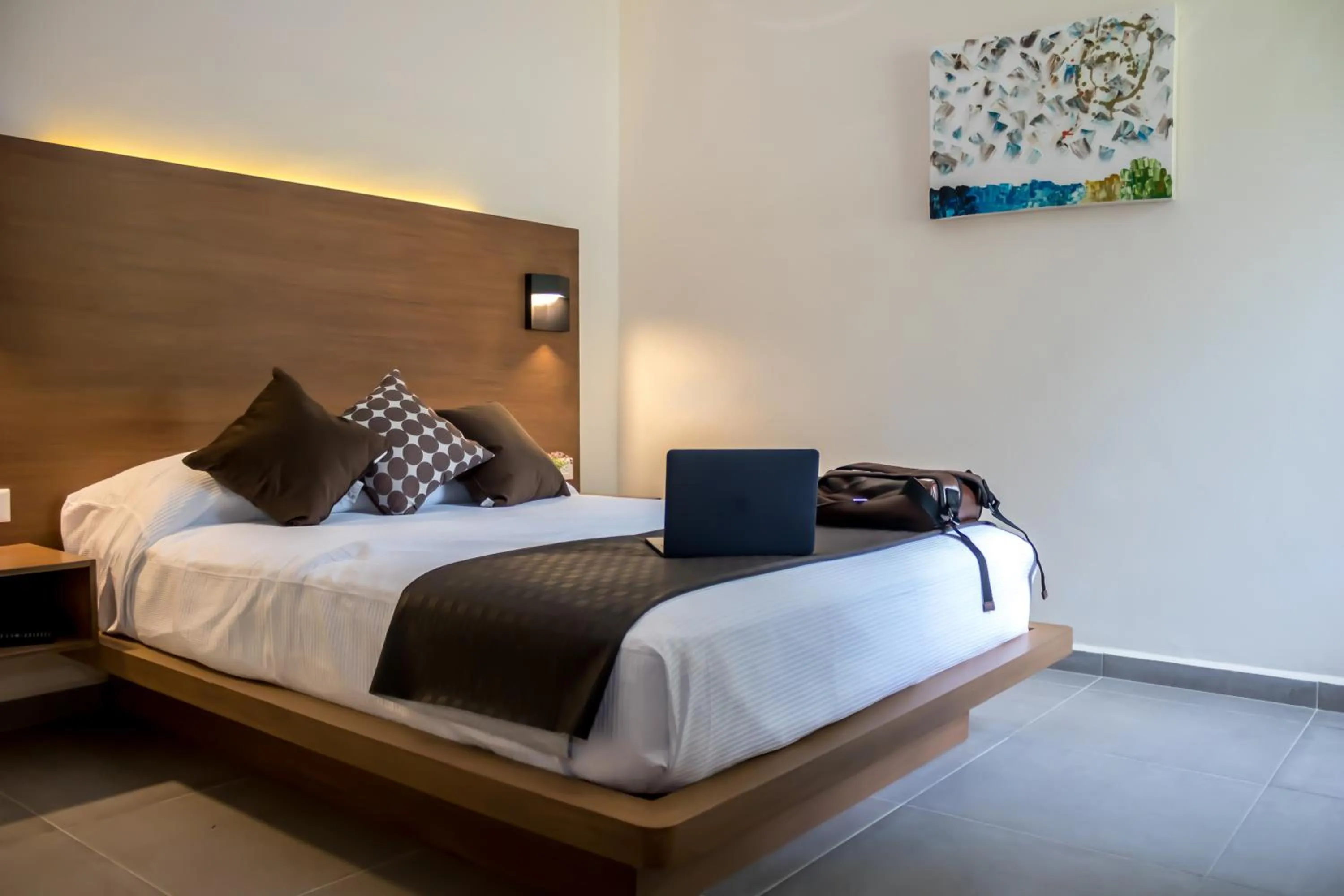 Bed in Viento Suites Cancún