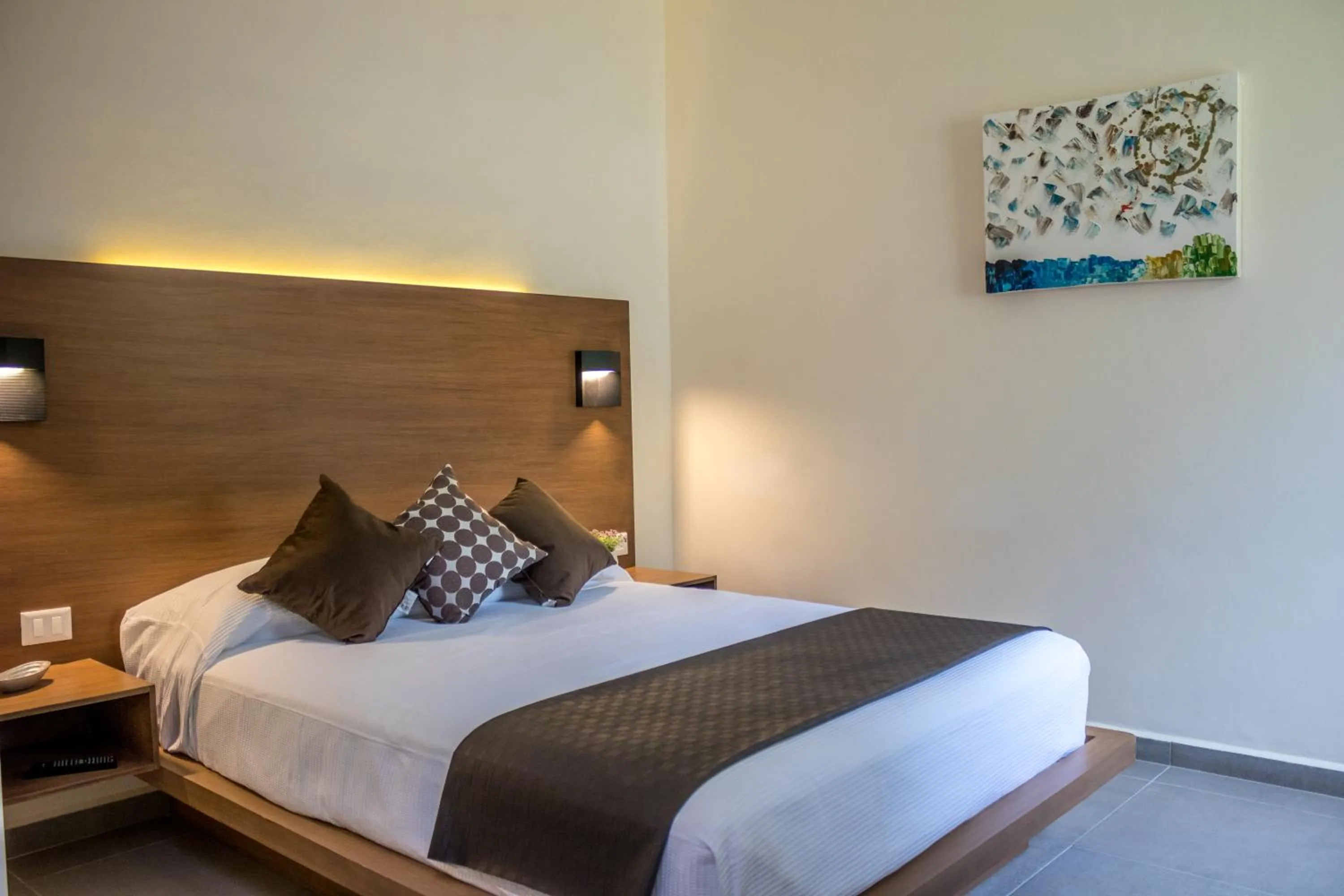 Bed in Viento Suites Cancún