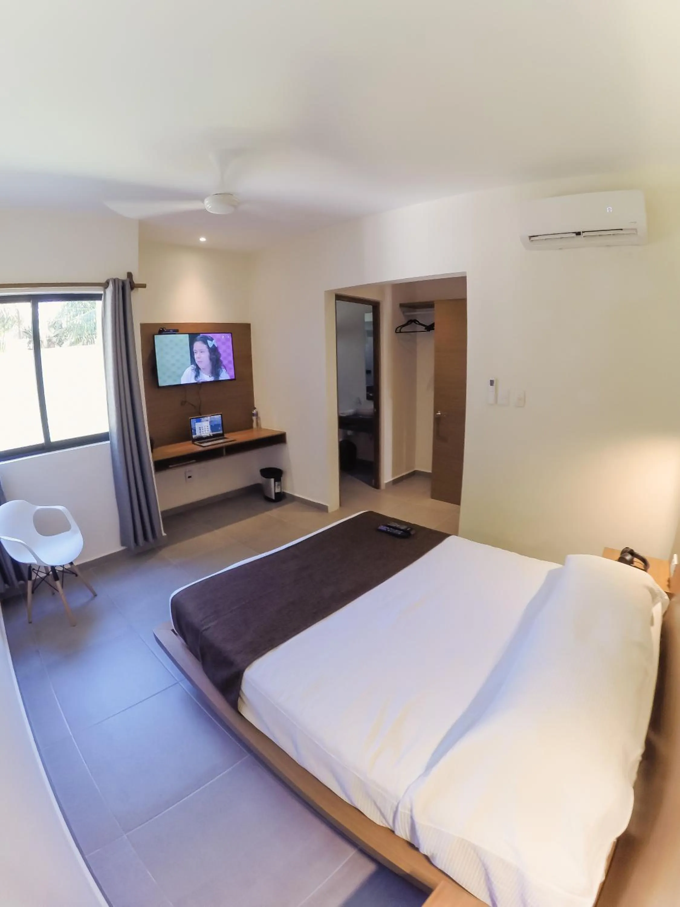 Bed in Viento Suites Cancún