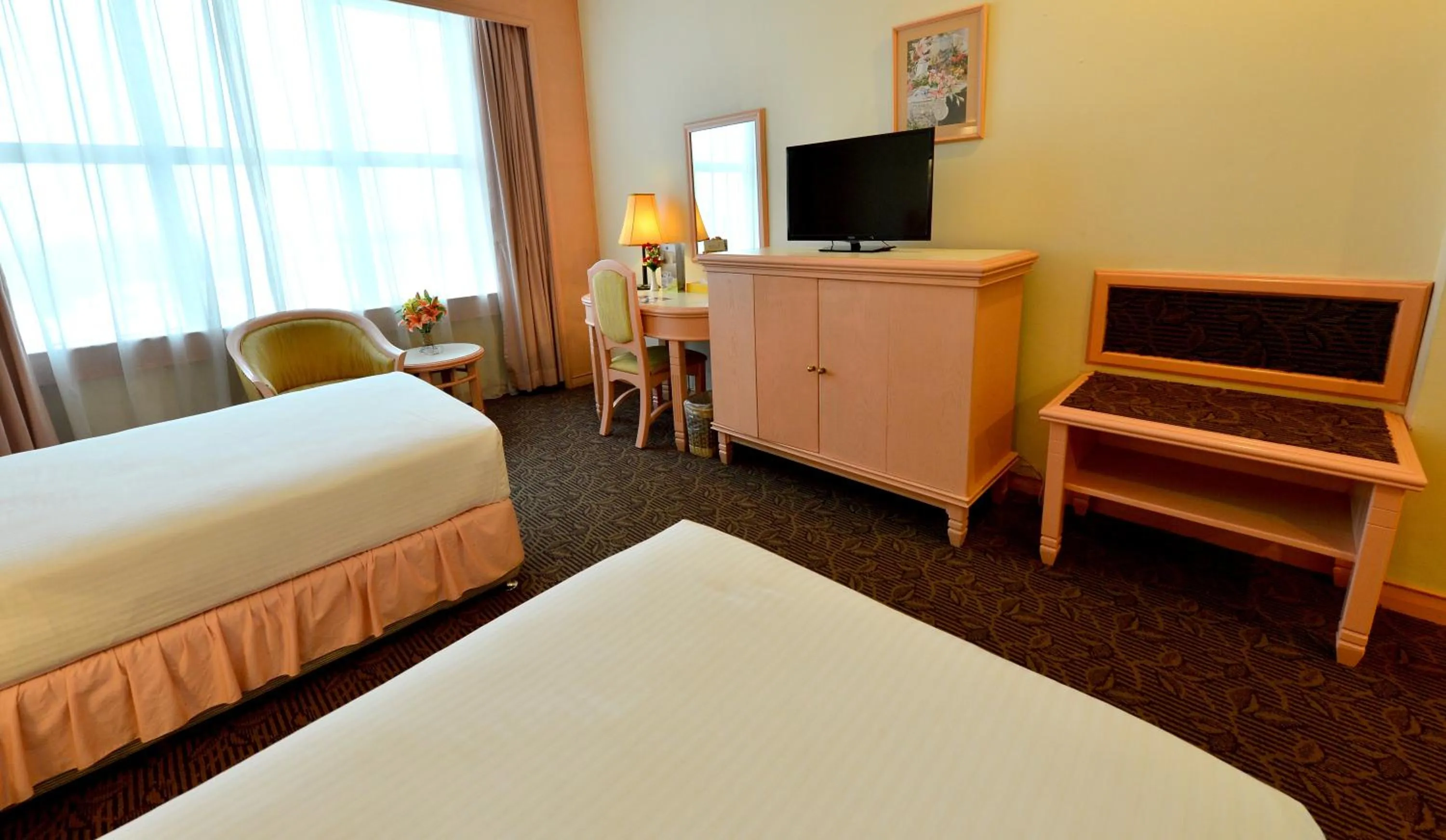 Bed in Emerald Puteri Hotel