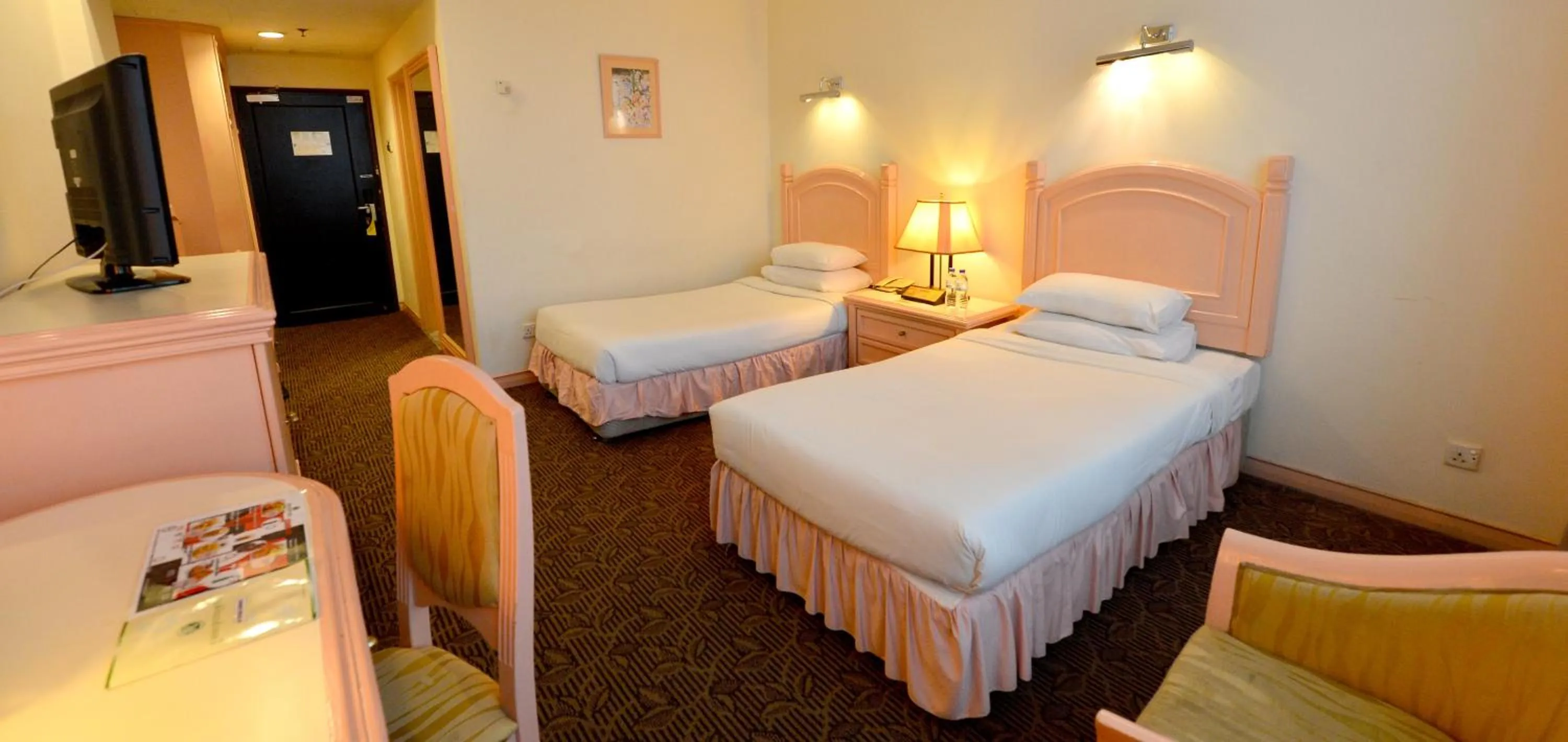 Bed in Emerald Puteri Hotel