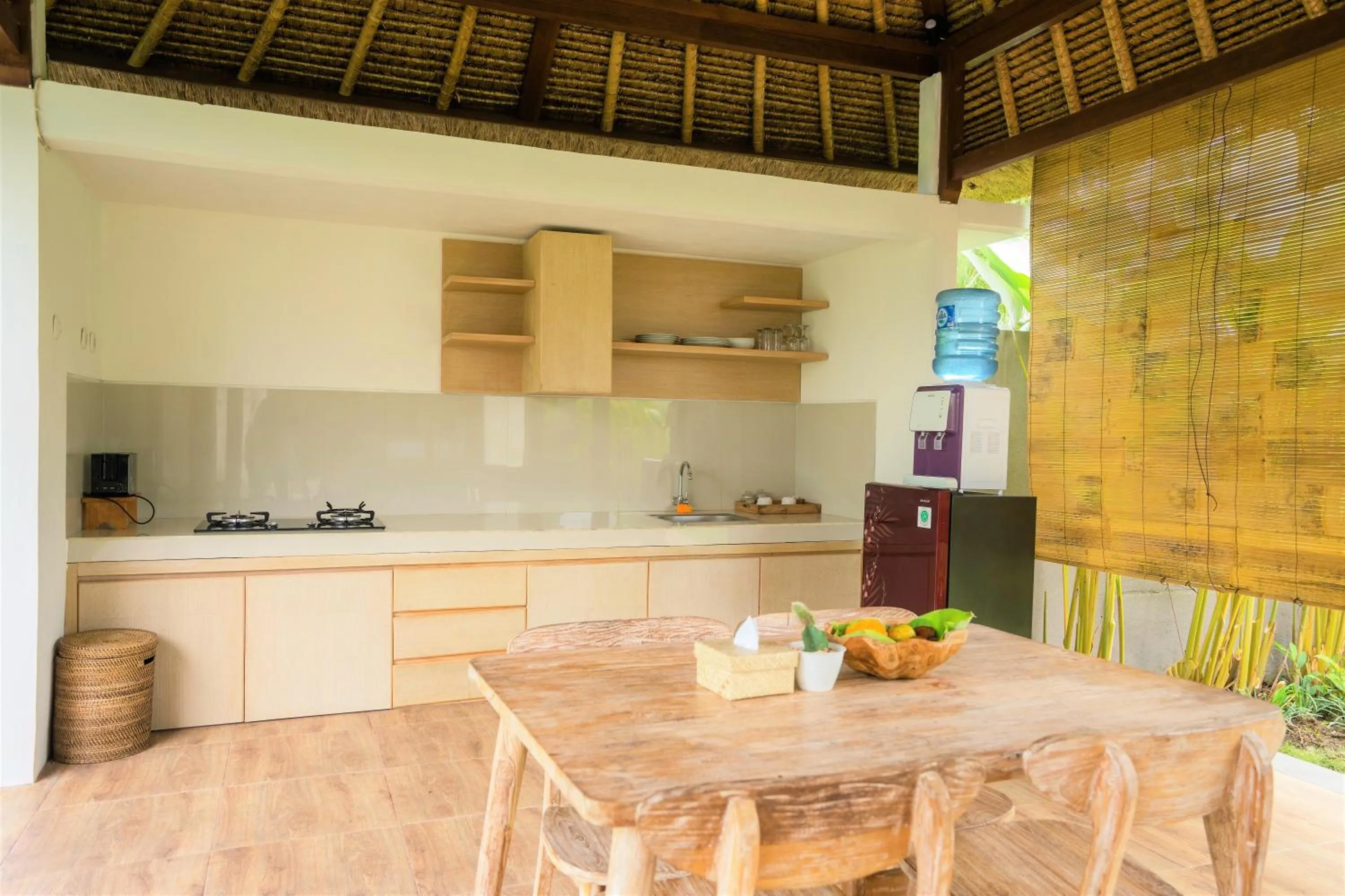 Kitchen or kitchenette in Three Gold Luxury Private Villas