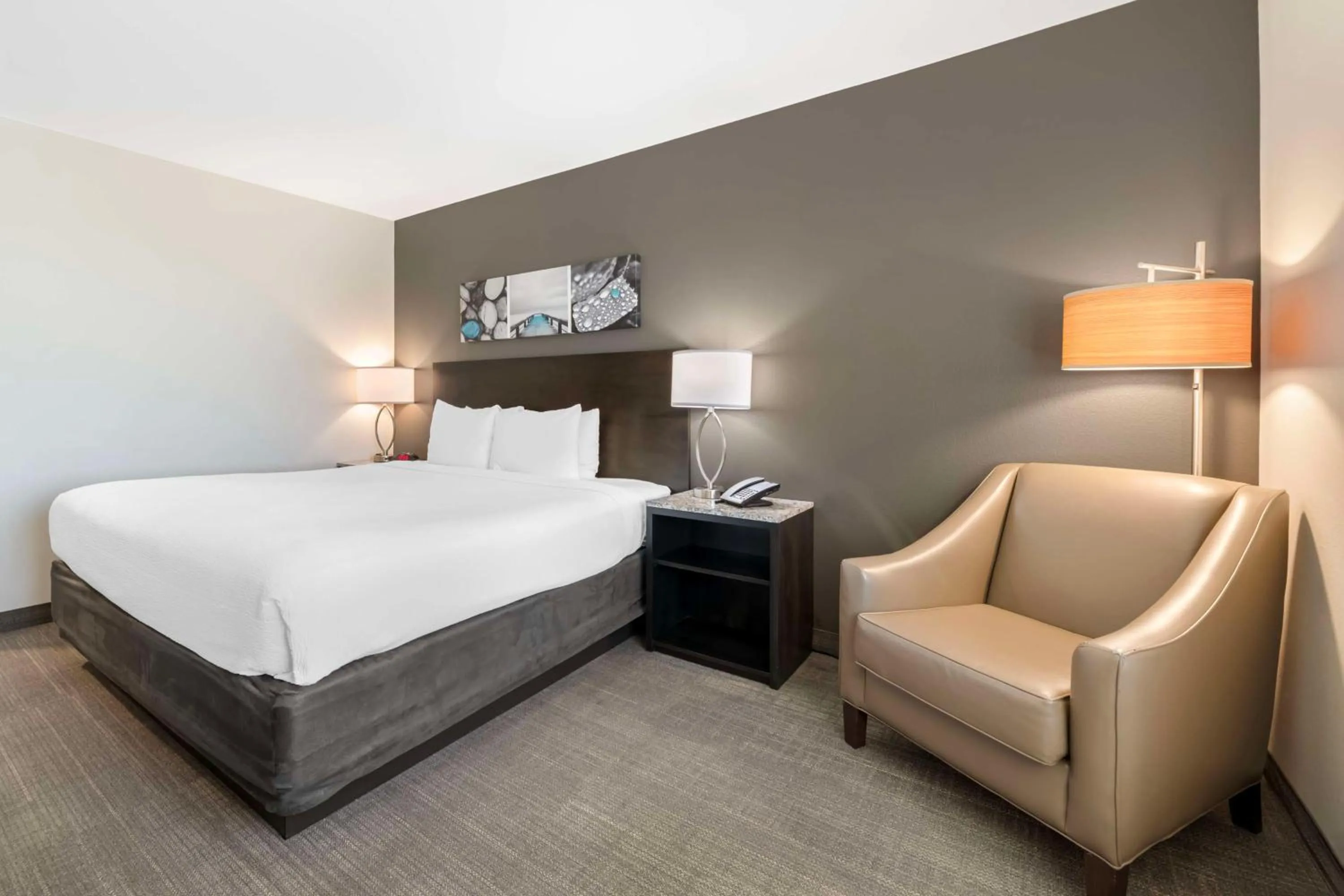 Bedroom, Bed in Magnolia Pointe; BW Signature Collection