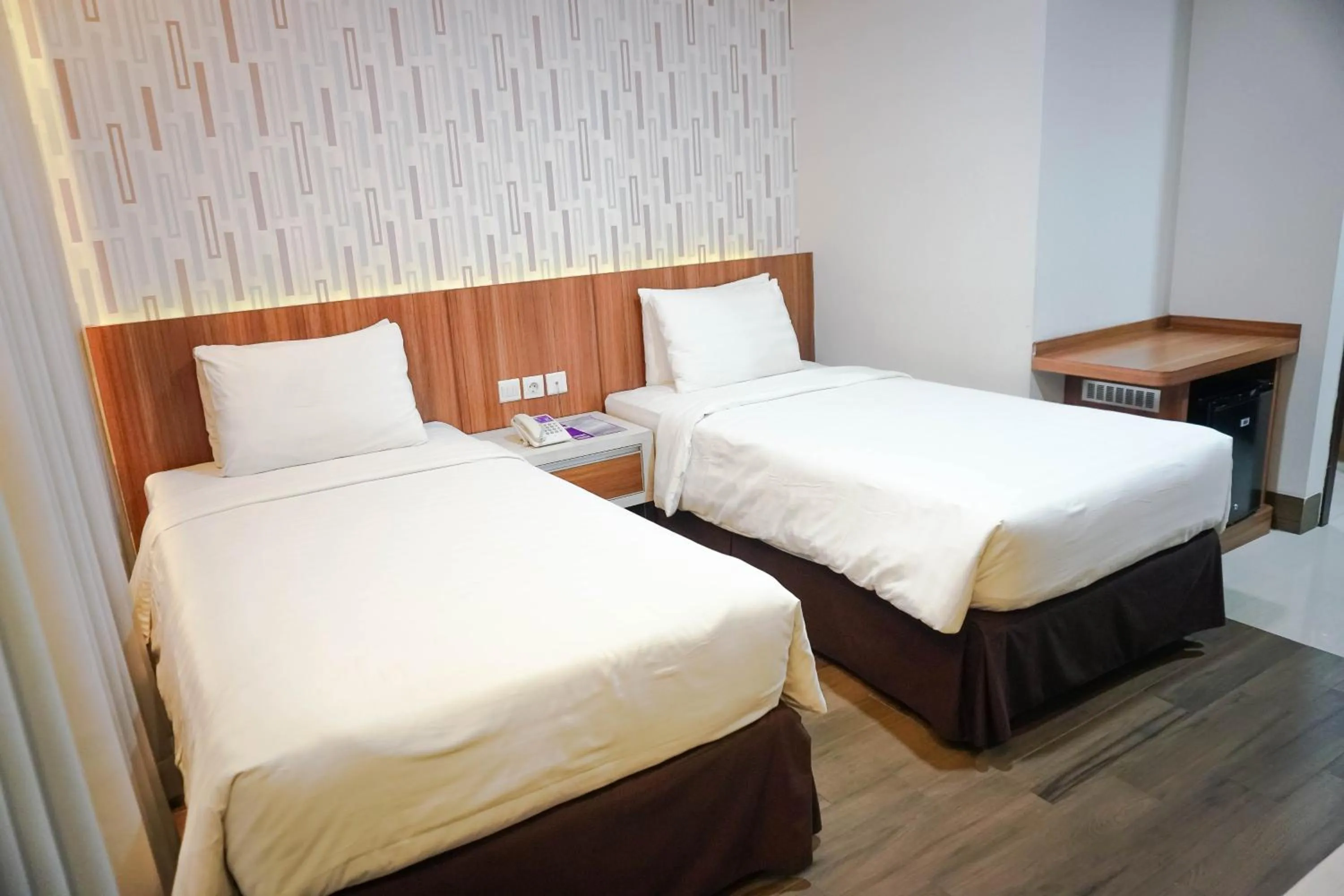 Bed in Harmoni Hotel Garut