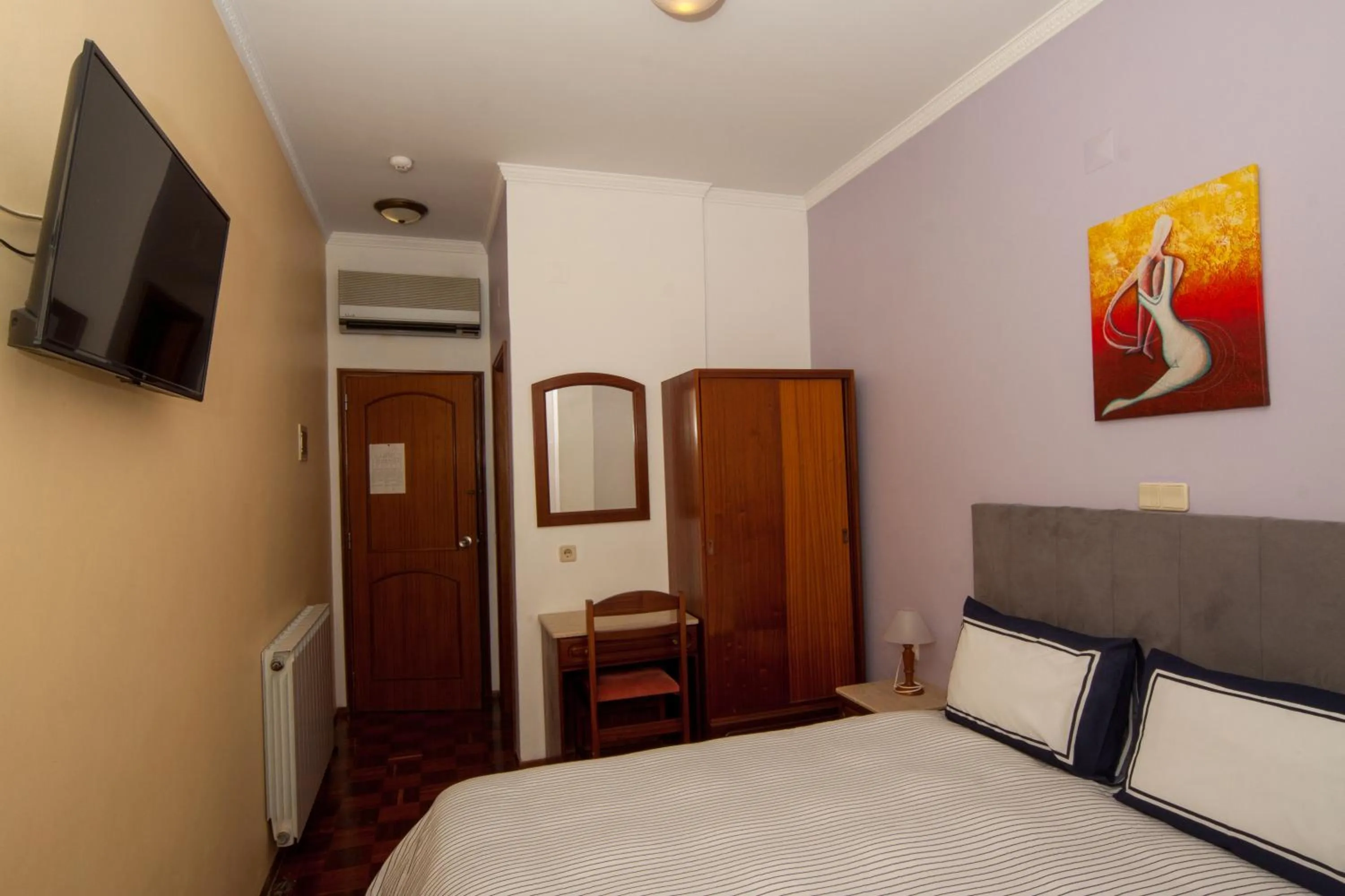 Bed in Hotel Leiriense