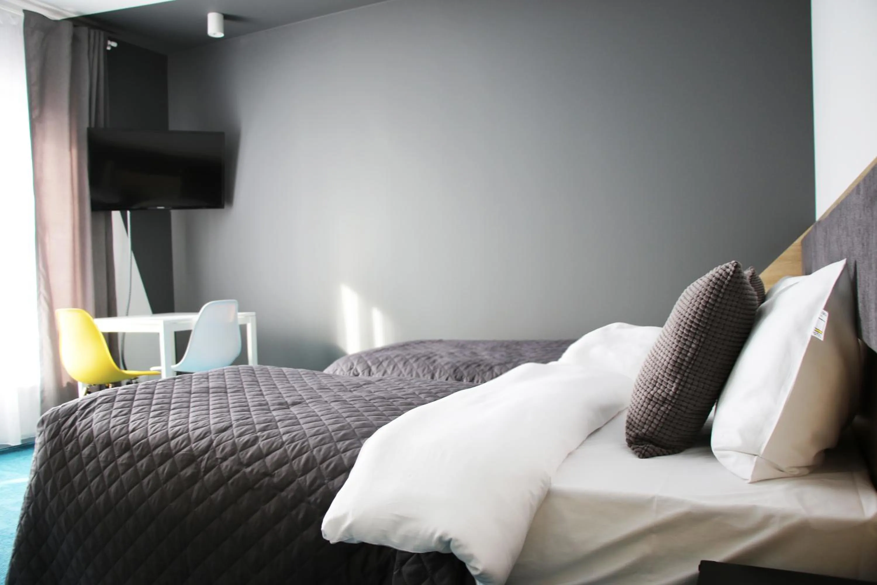 Bed in Lemon Plaza Hotel