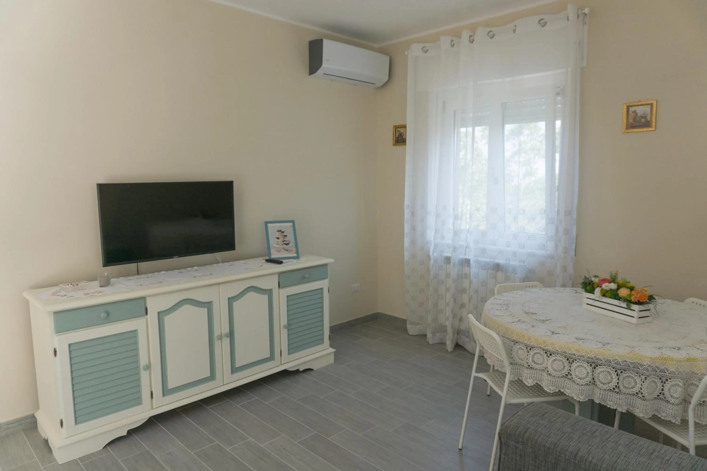 Communal lounge/ TV room in B&B Casa di Mimma