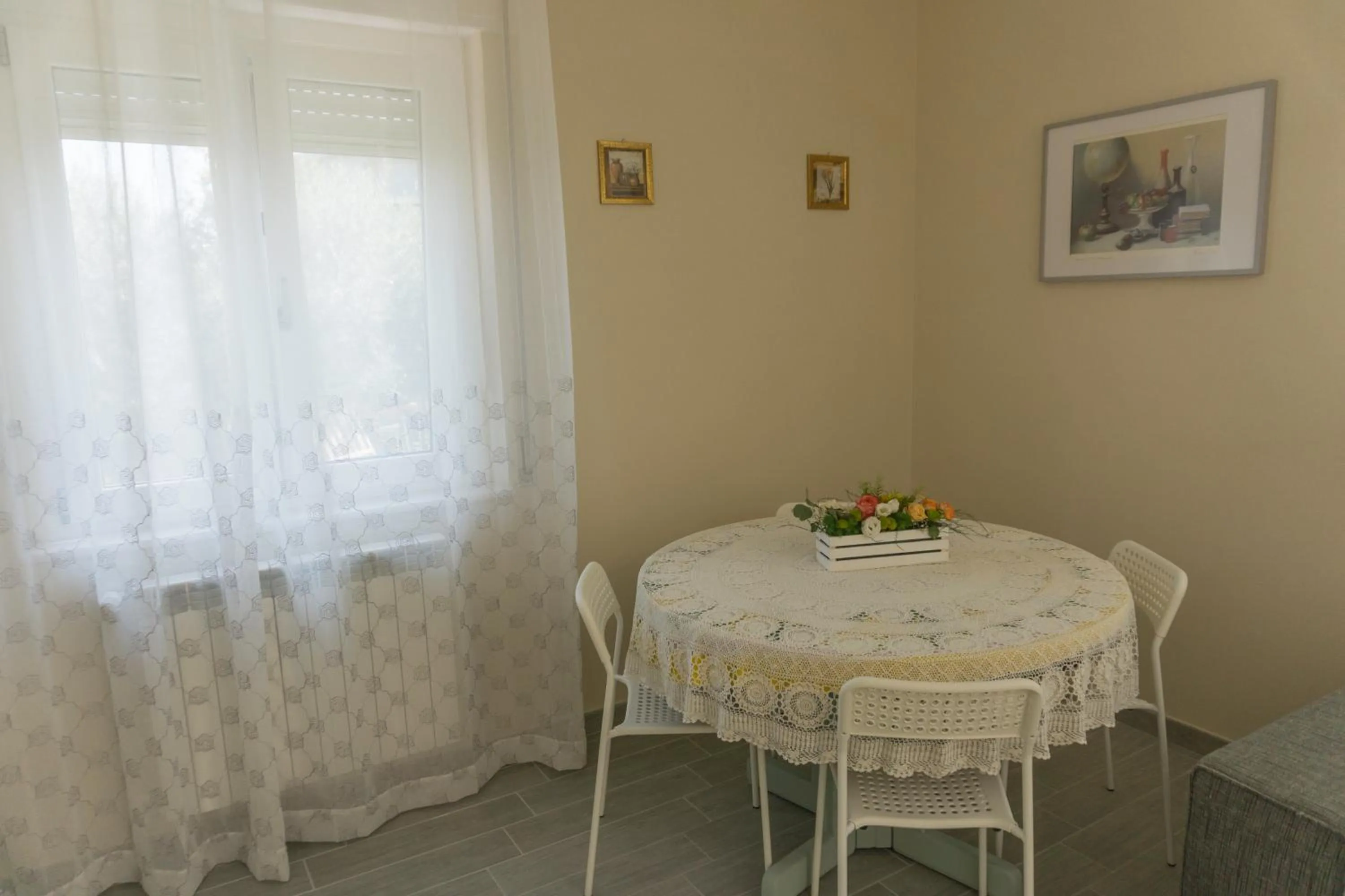 Communal lounge/ TV room in B&B Casa di Mimma