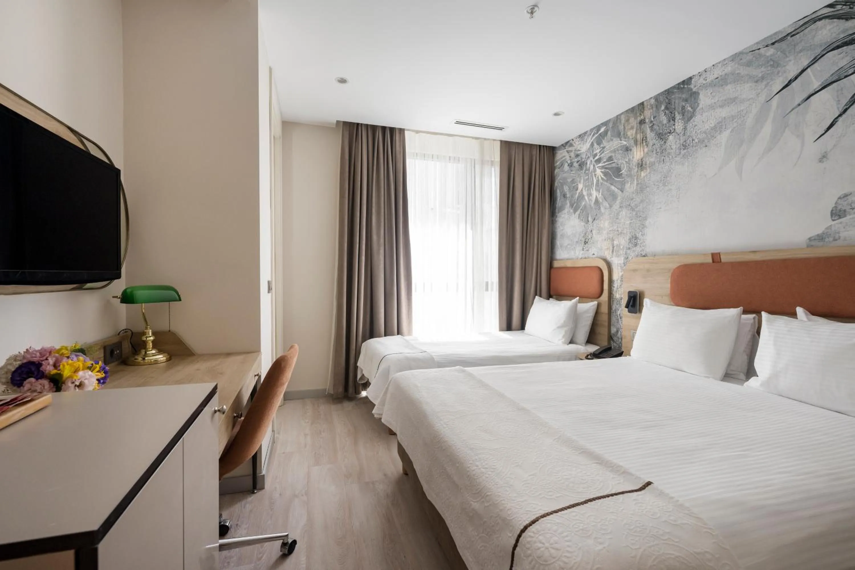 Bed in Upsuites Hotel