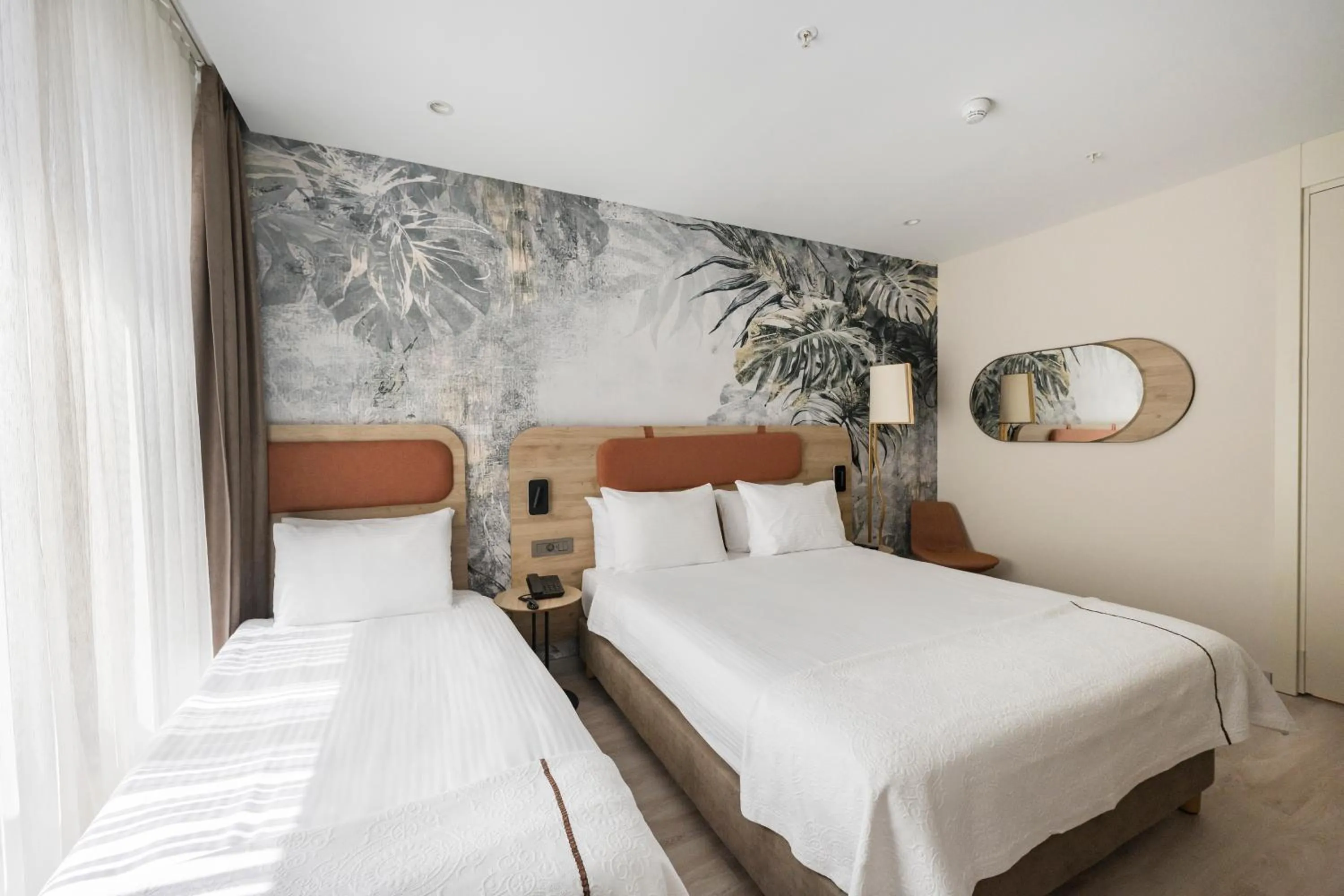 Bed in Upsuites Hotel