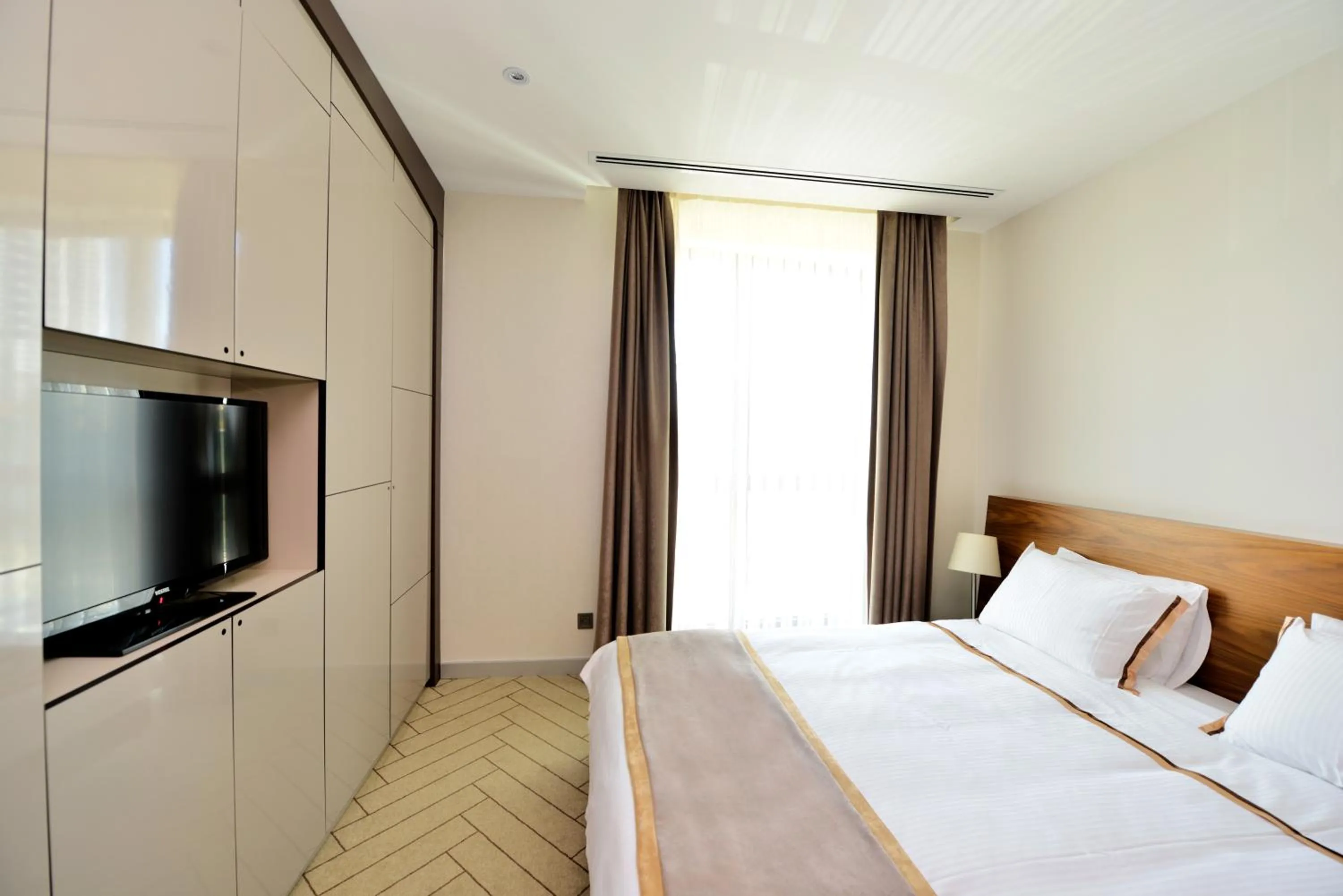 Bedroom, Bed in Upsuites Hotel