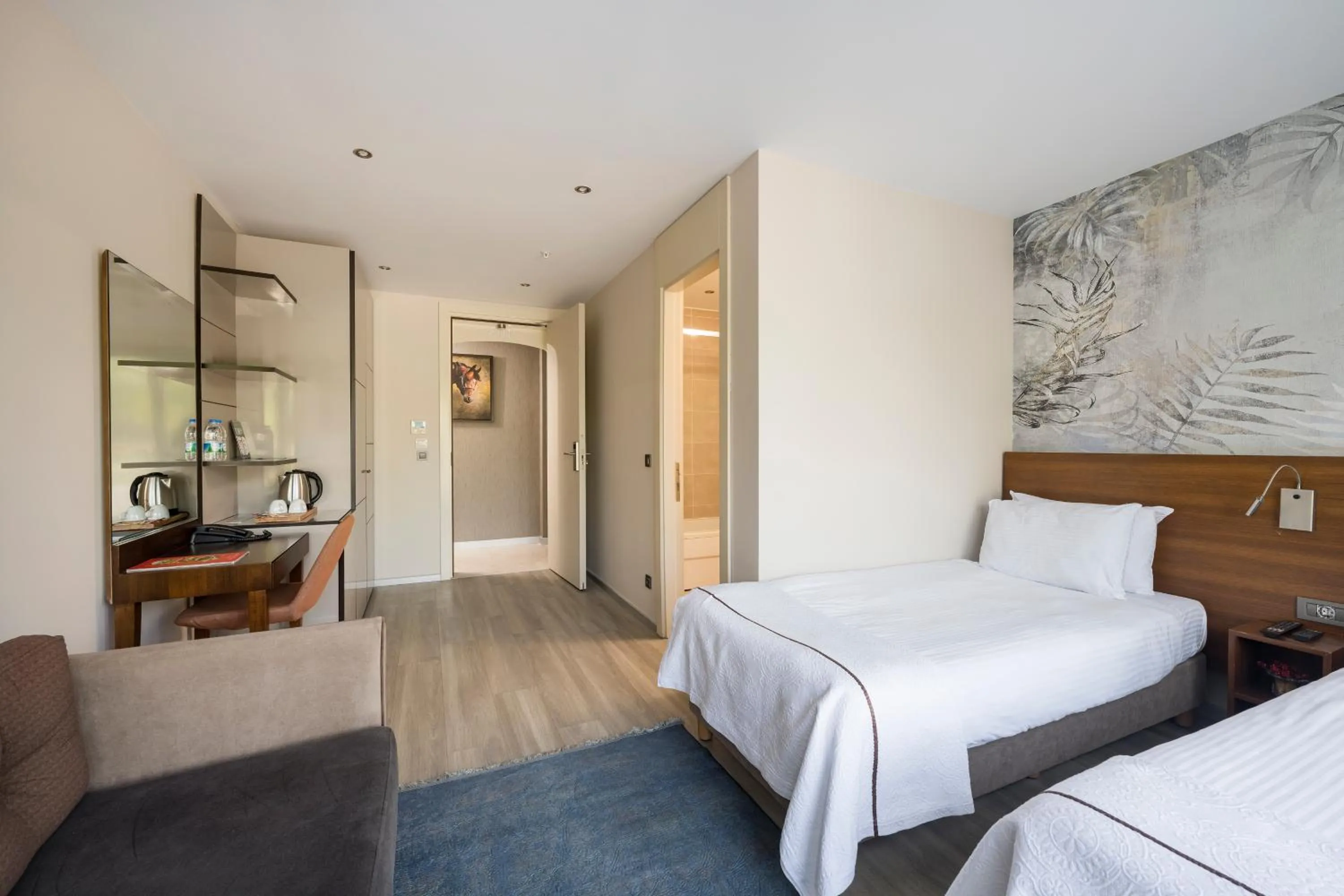 Bed in Upsuites Hotel