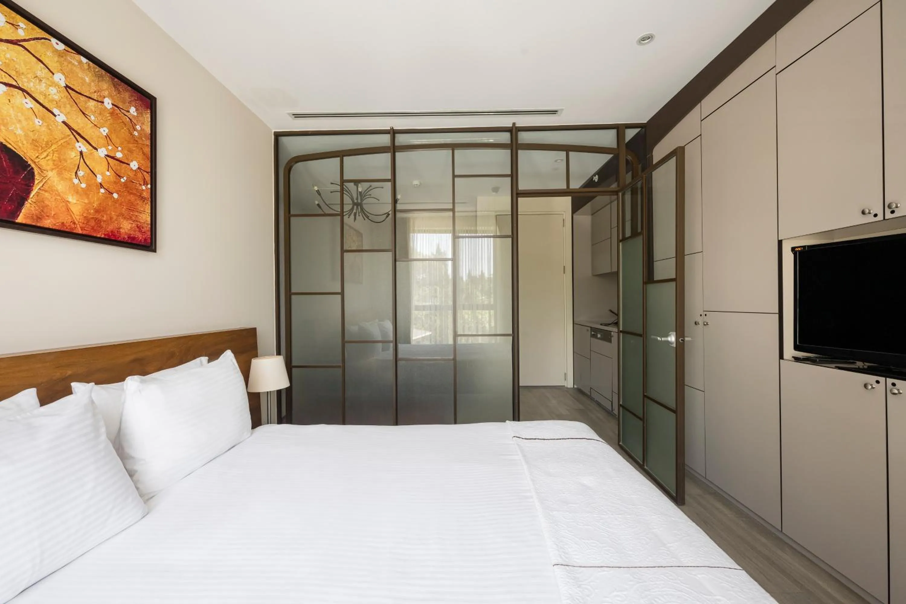 Bed in Upsuites Hotel