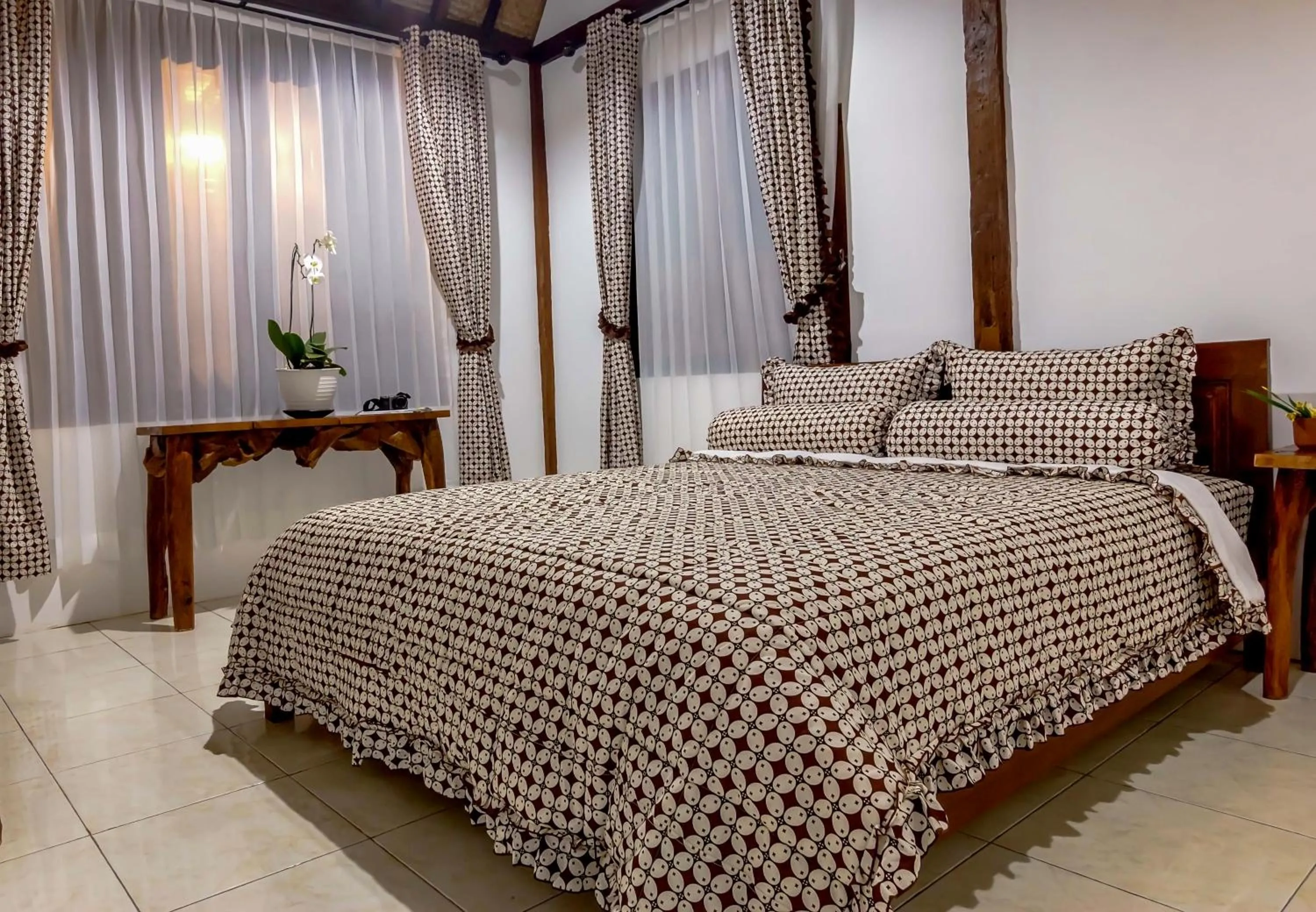 Bed in The Omah Borobudur