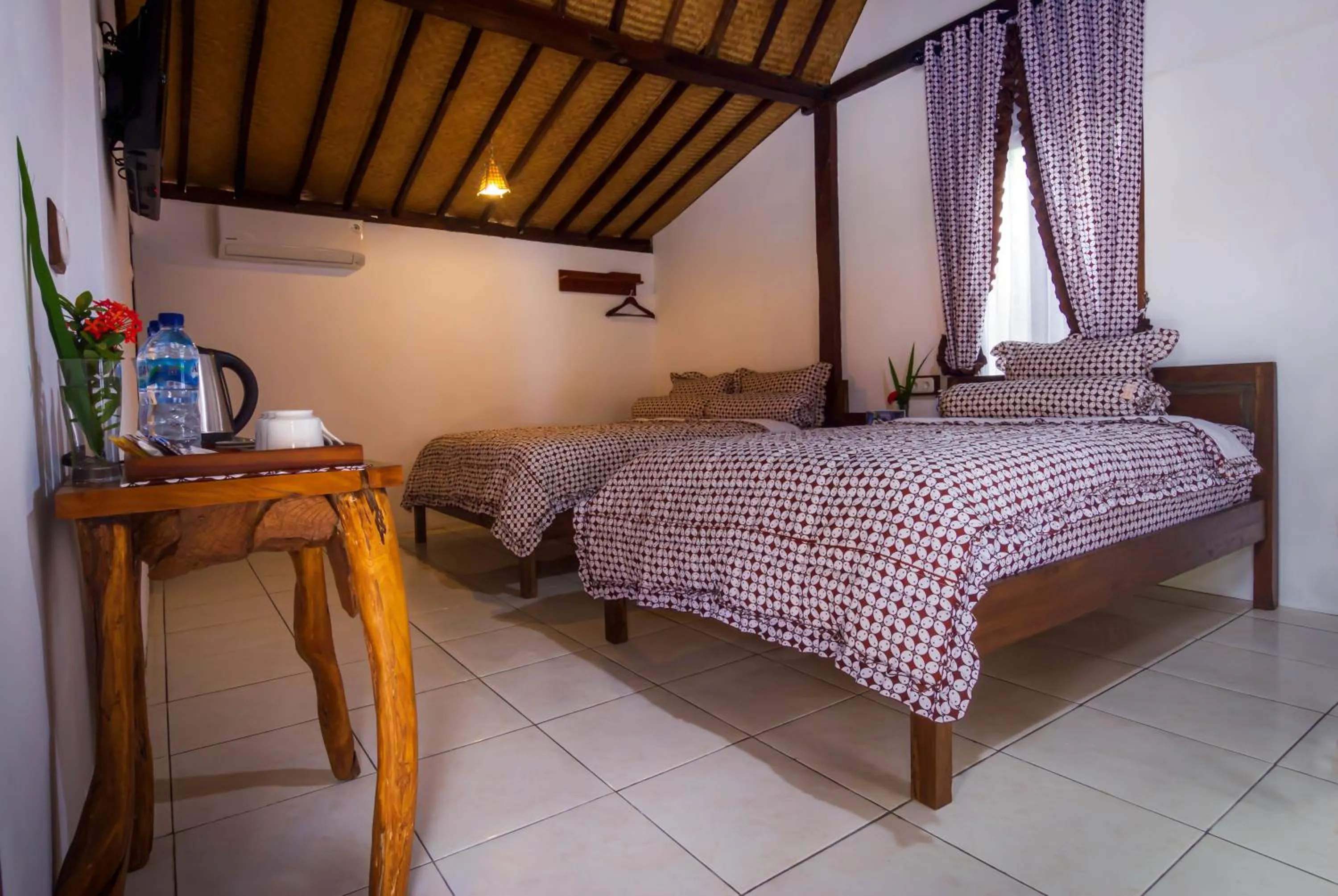 Bed in The Omah Borobudur