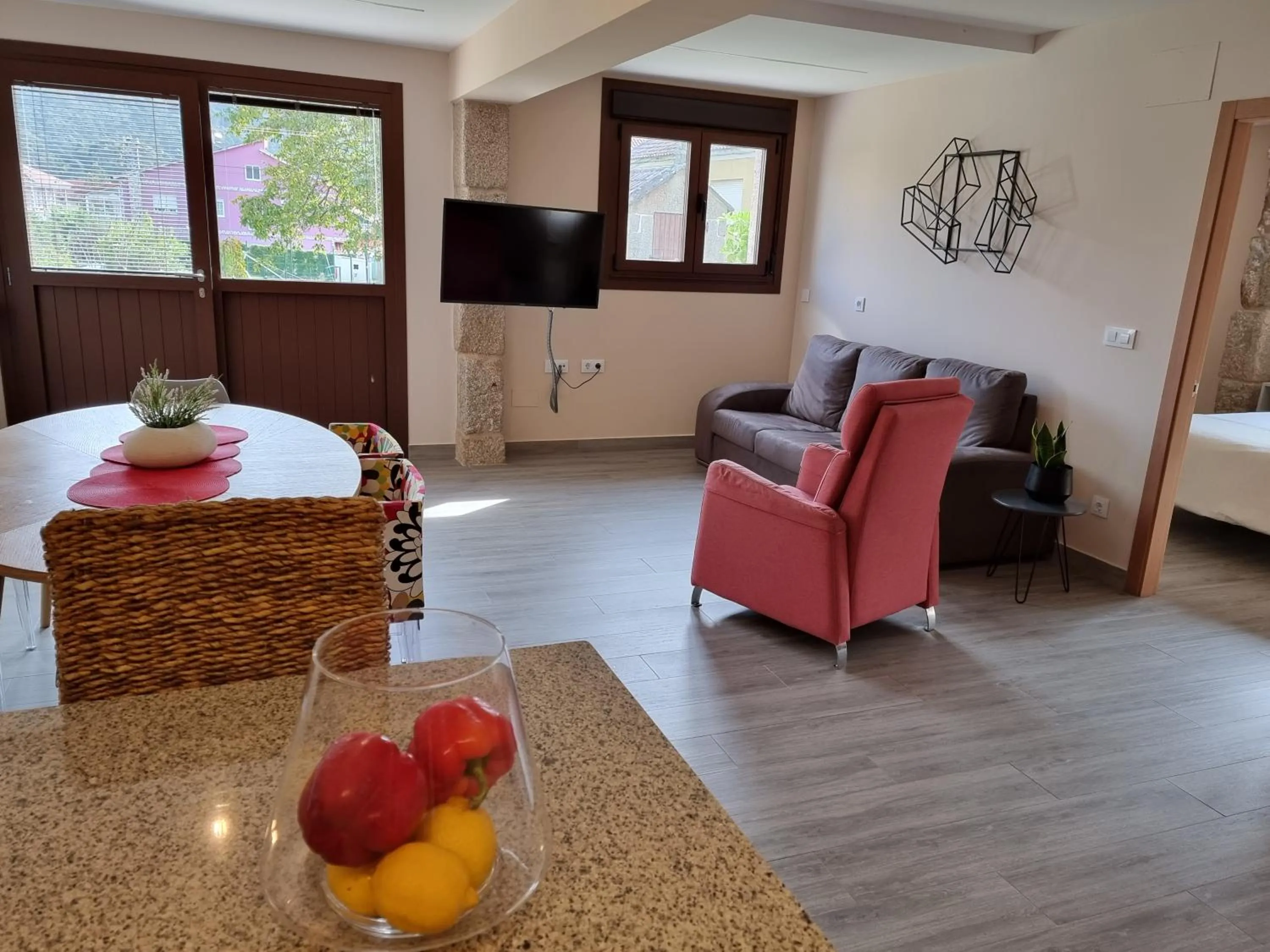 Living room, Bed in Apartamentos Ria de Aldan