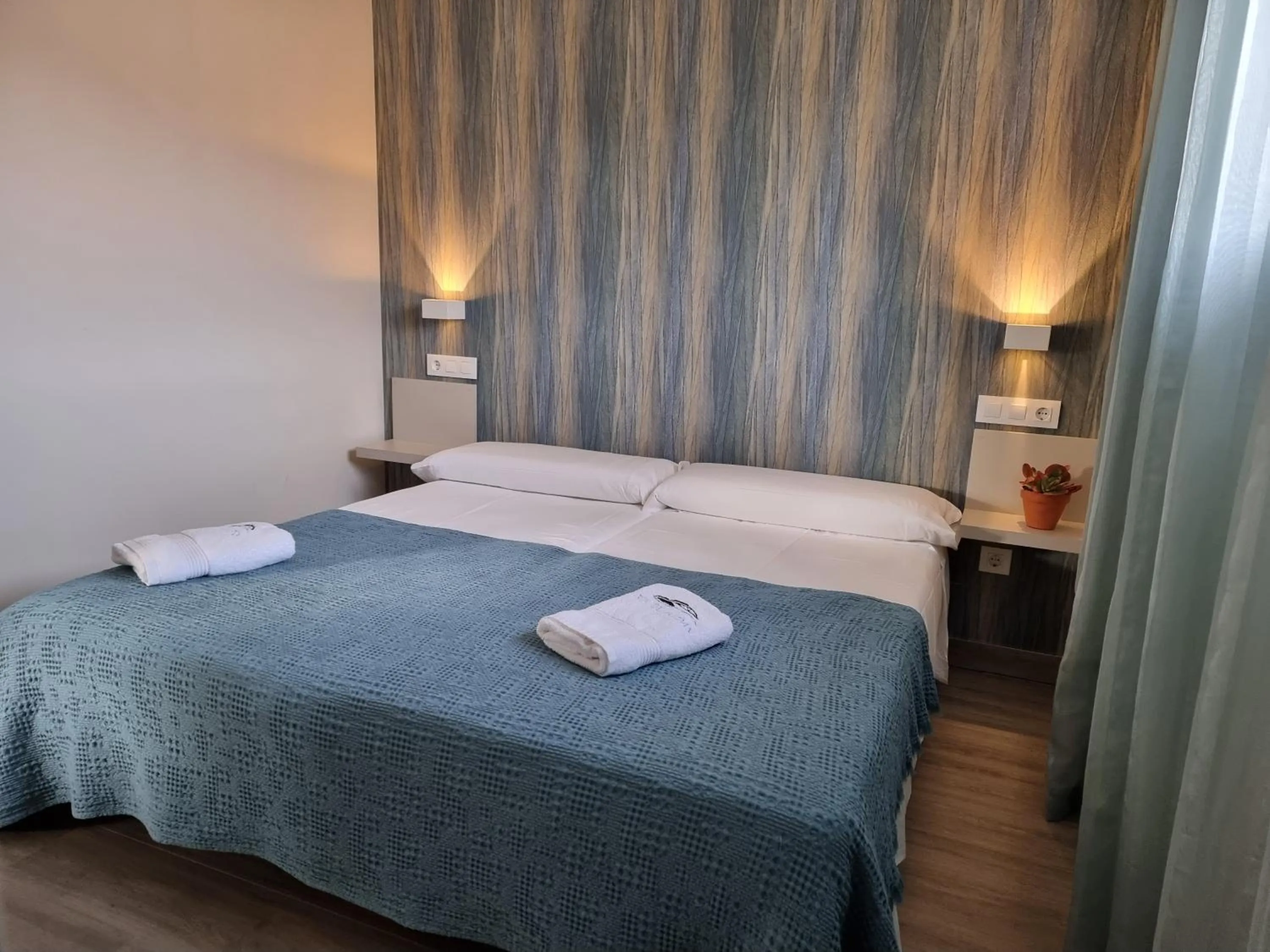 Bedroom, Bed in Apartamentos Ria de Aldan