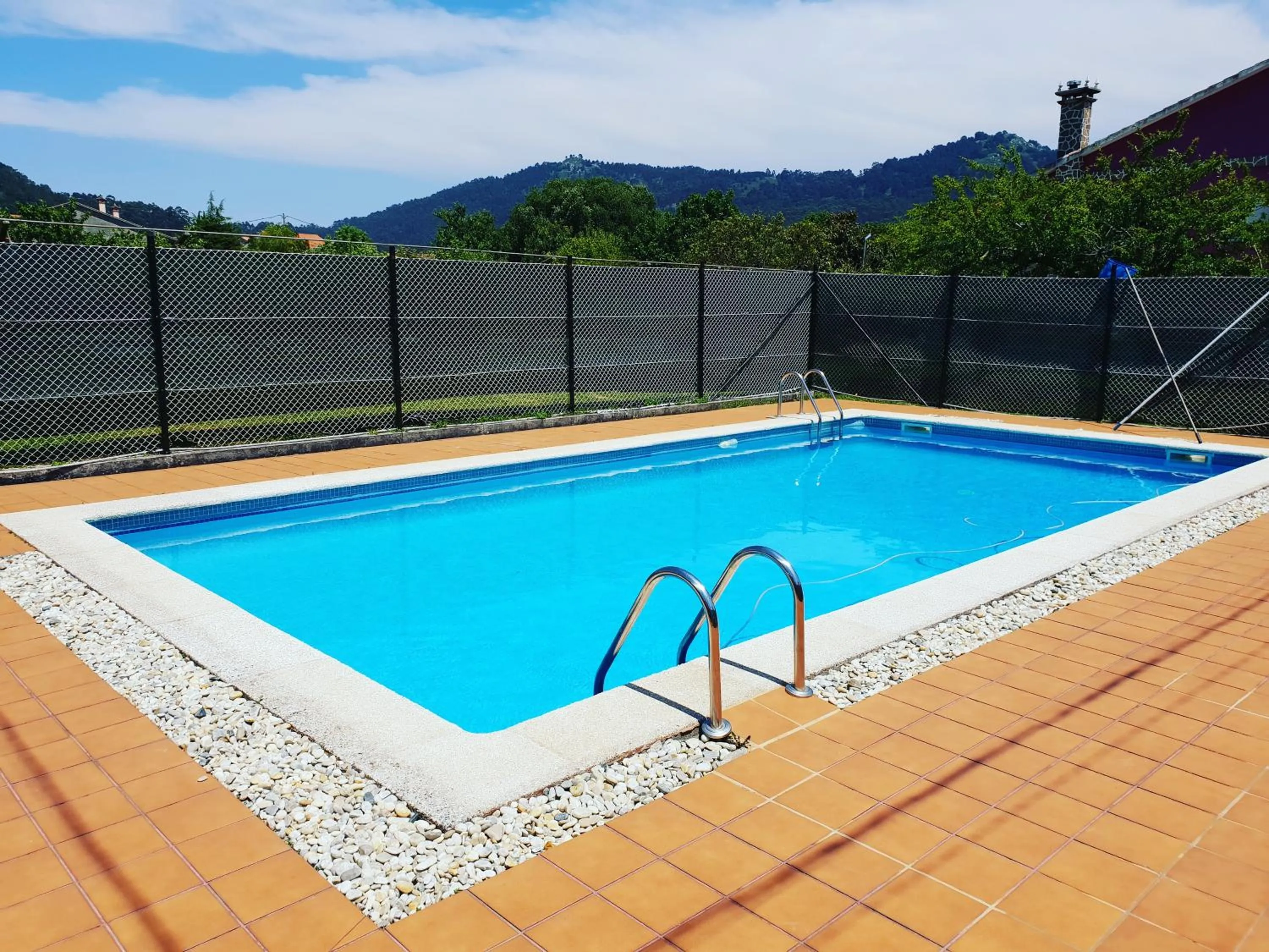 Swimming pool in Apartamentos Ria de Aldan