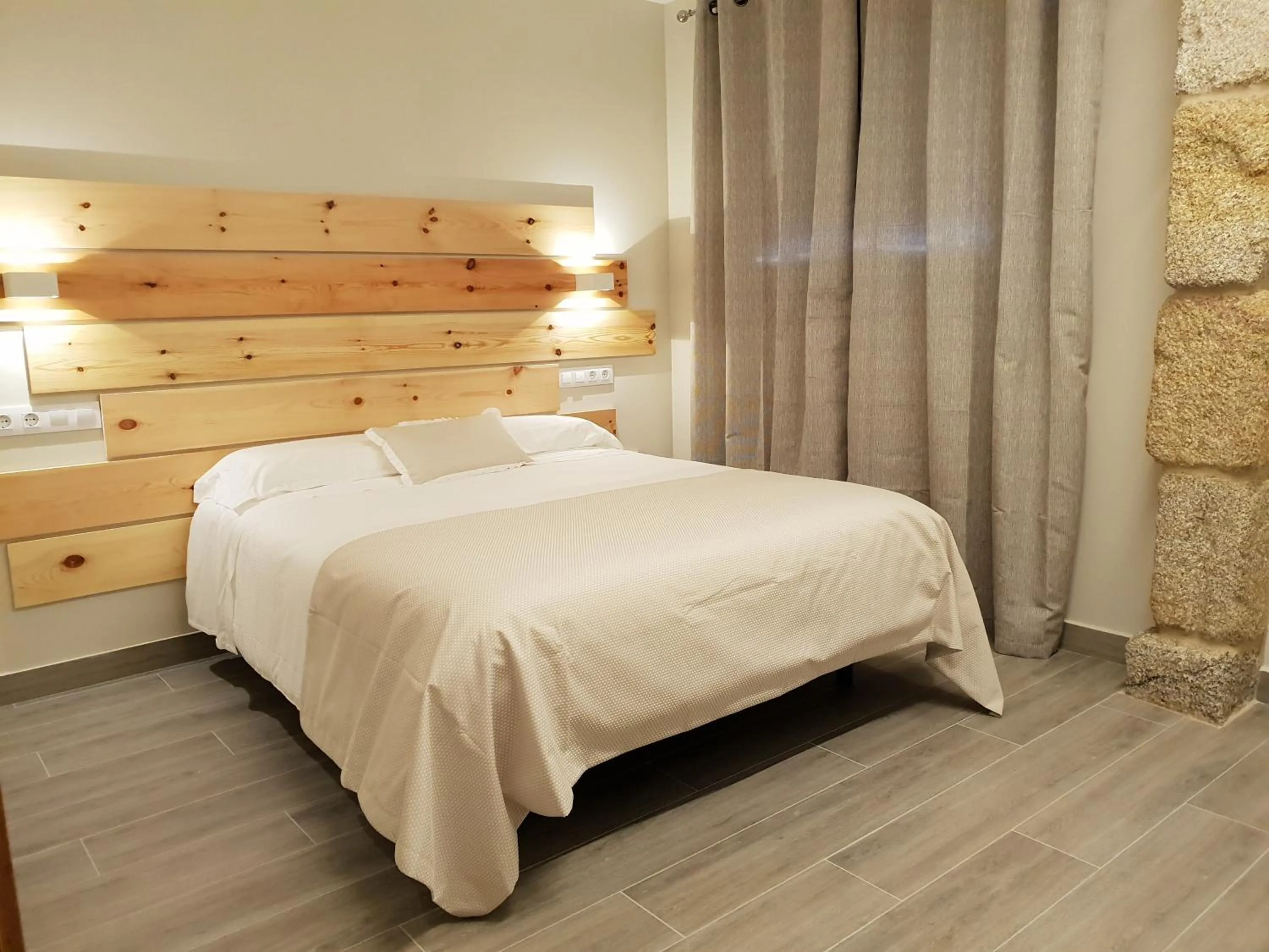 Bed in Apartamentos Ria de Aldan