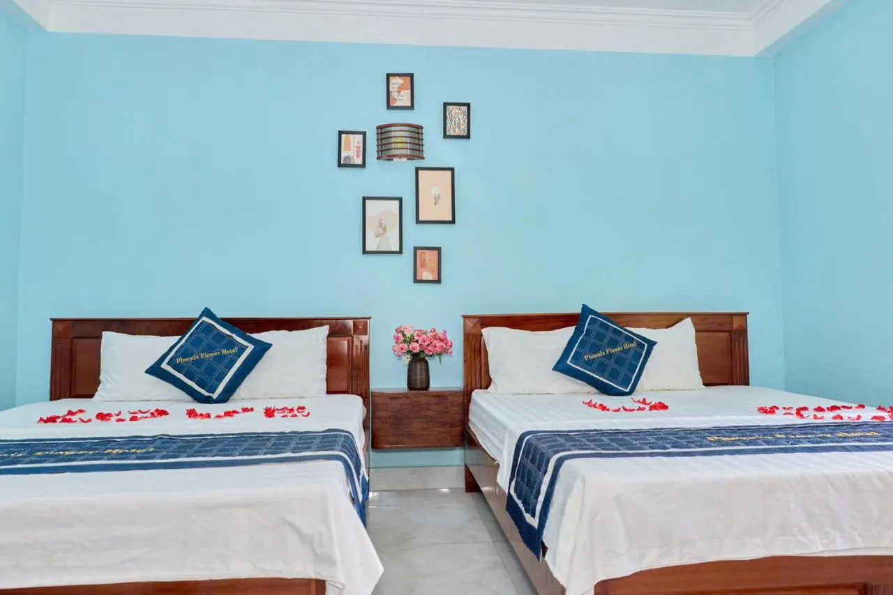 Bed in Phoenix Flower Hotel