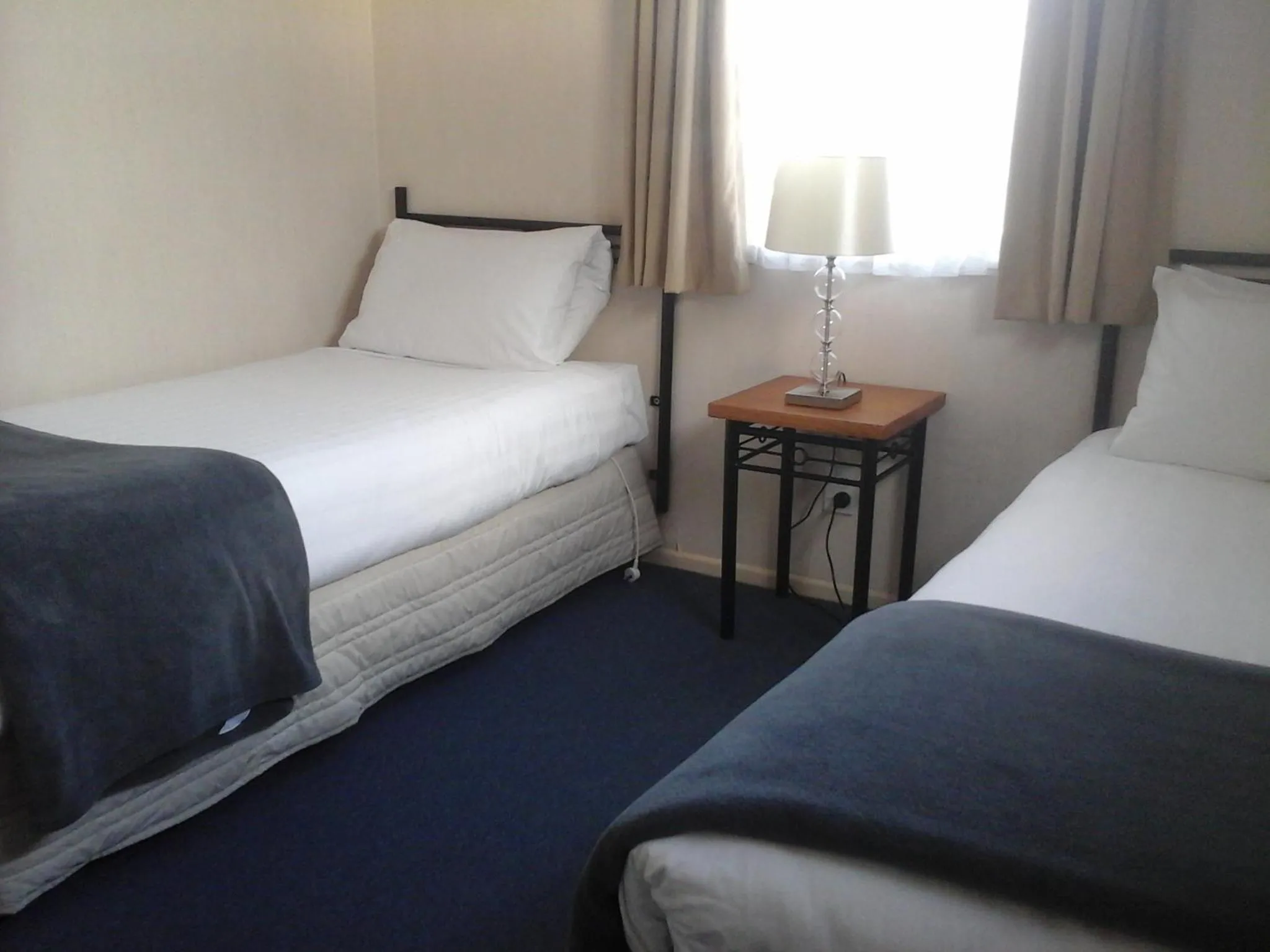 Bed in South Park Motel