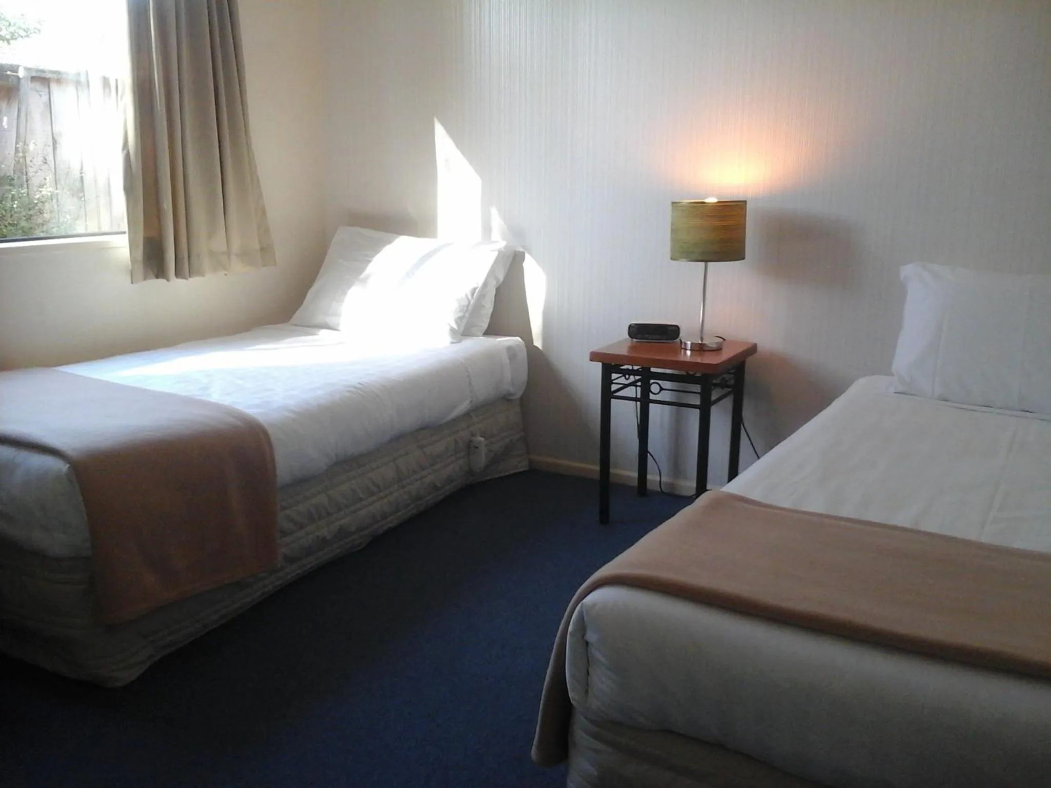 Bed in South Park Motel