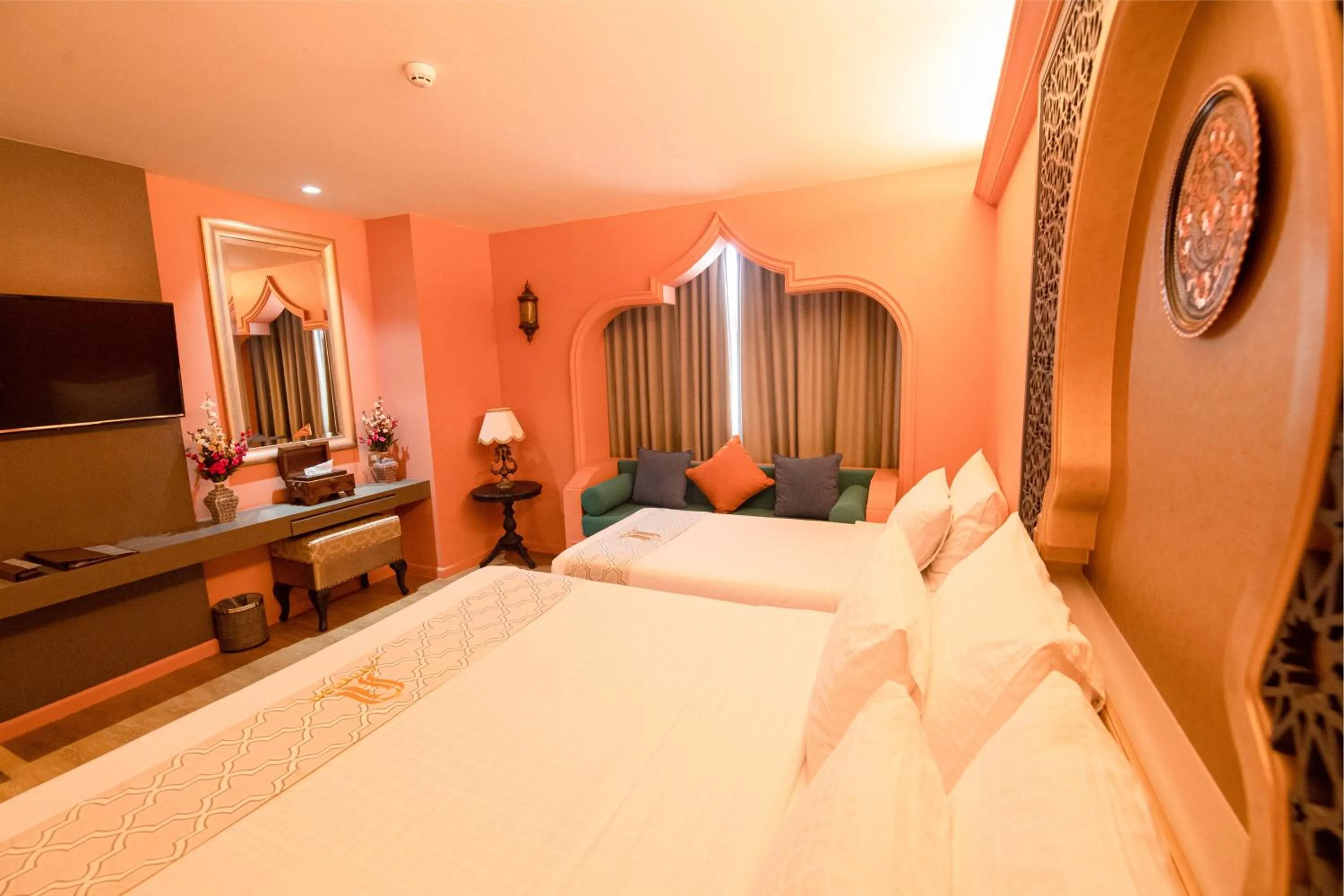 Seating area, Bed in Amman Unique Hotel