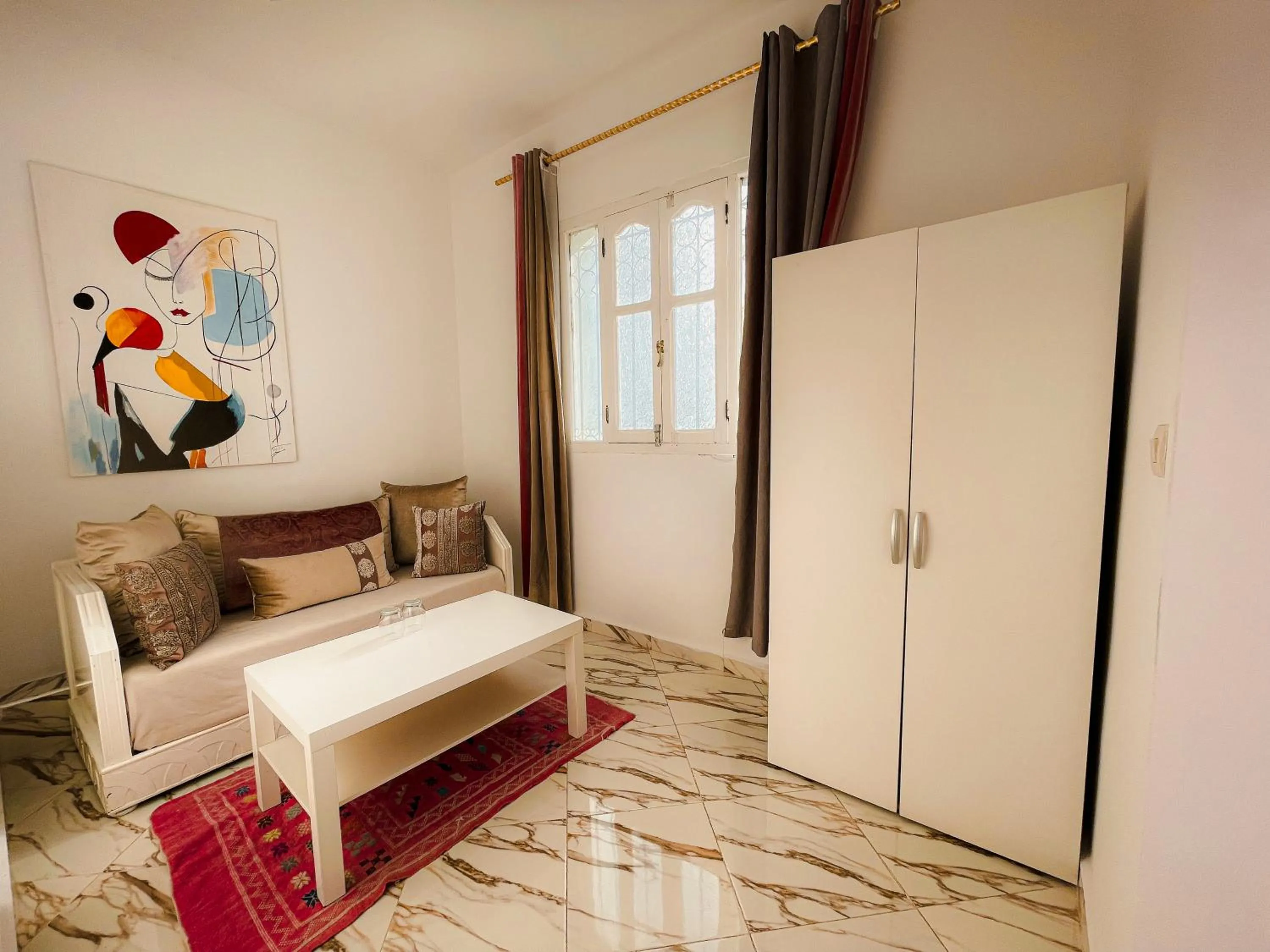 Living room, Bed in Hotel Princesse Ilham