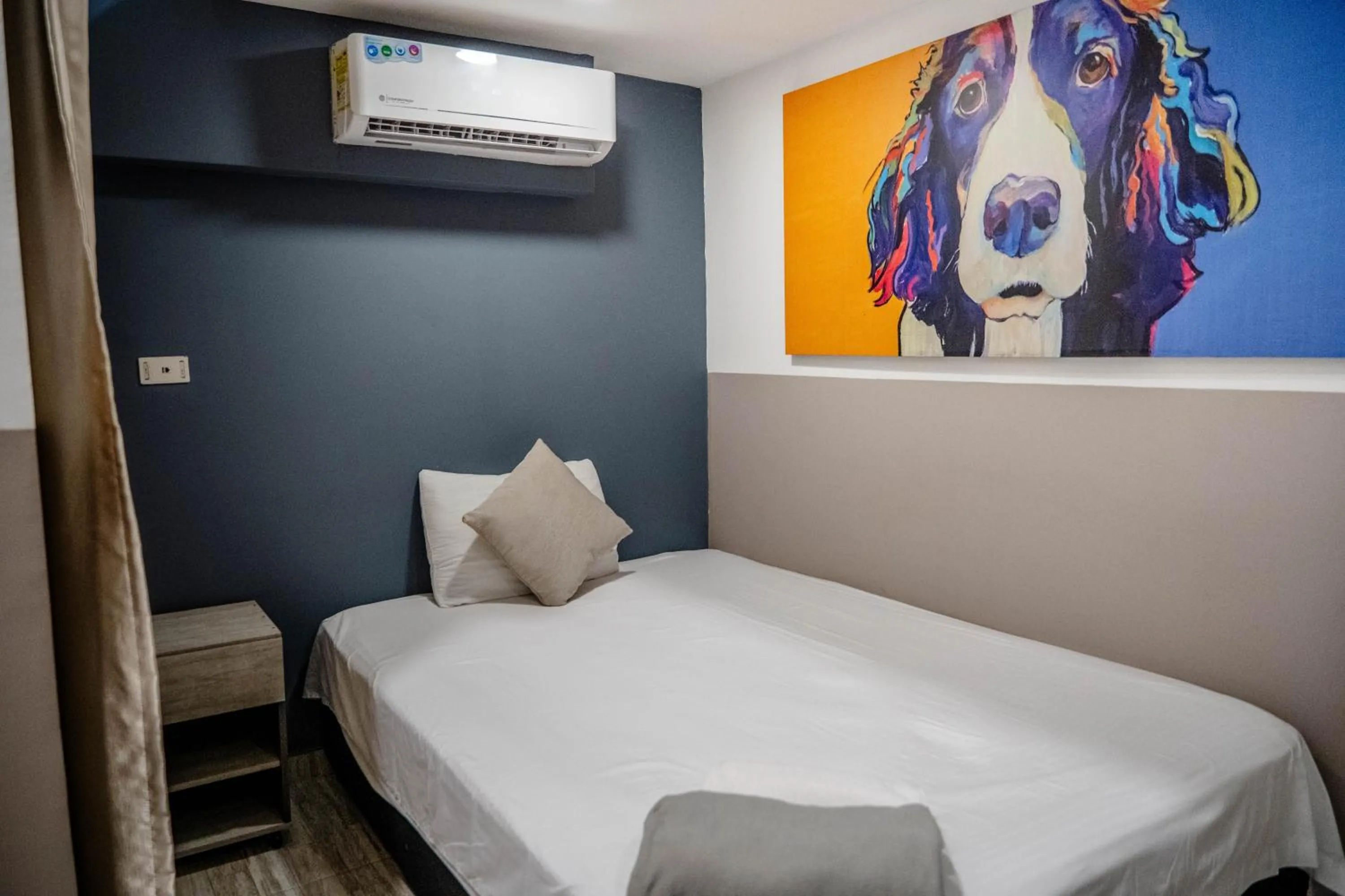 Bed in Bahia 79 Apartasuites Cerca al Centro