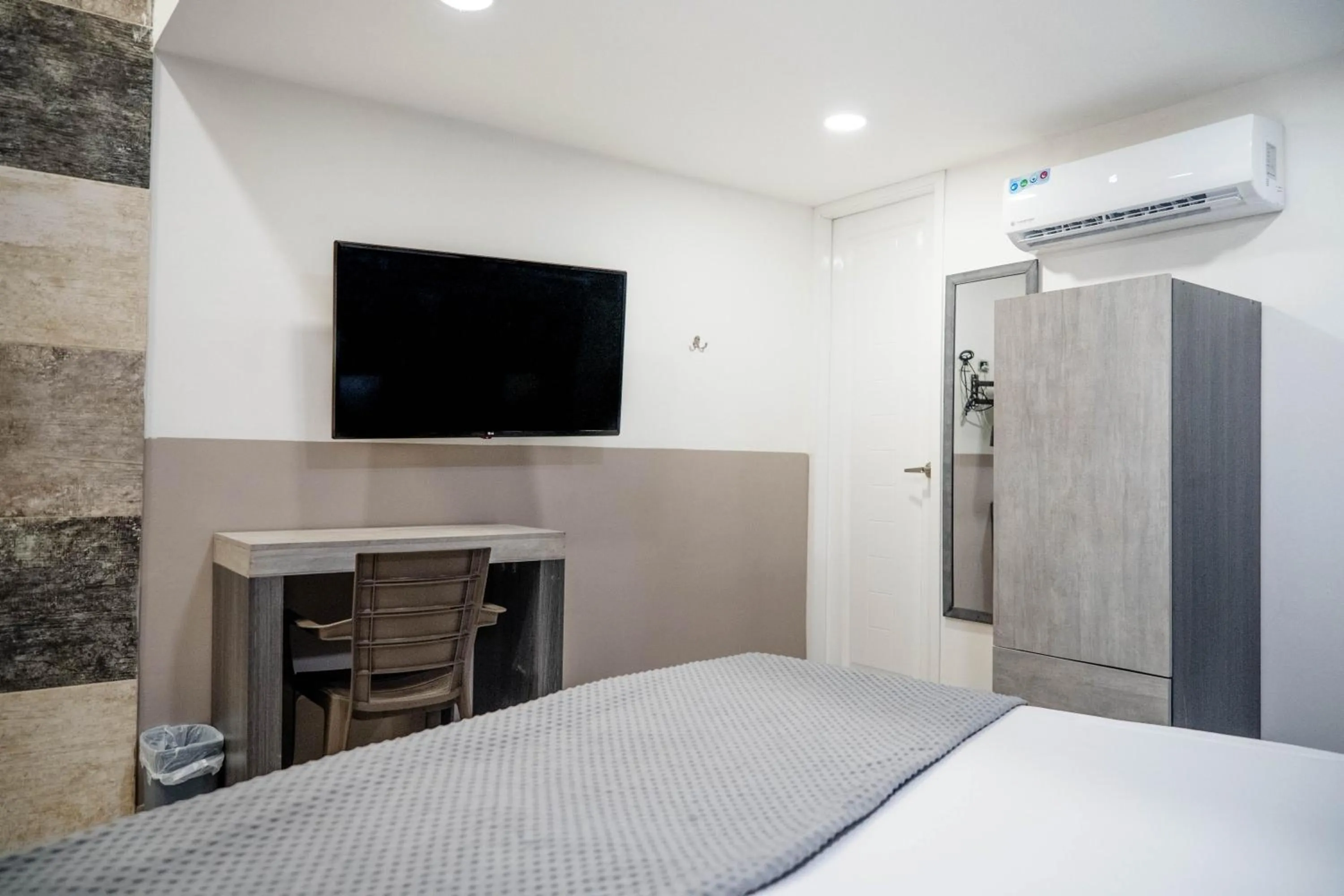 Bed in Bahia 79 Apartasuites Cerca al Centro