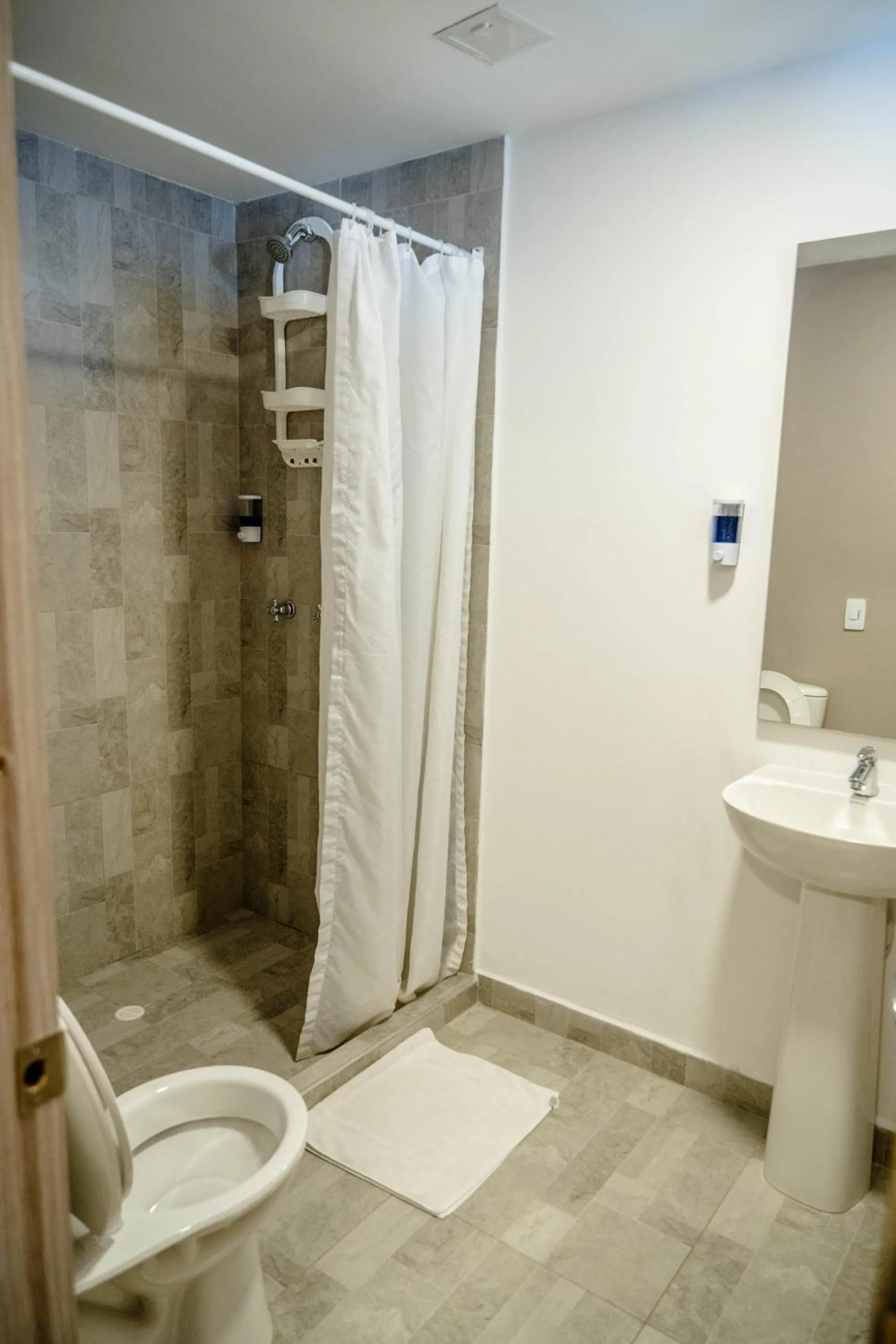 Shower in Bahia 79 Apartasuites Cerca al Centro